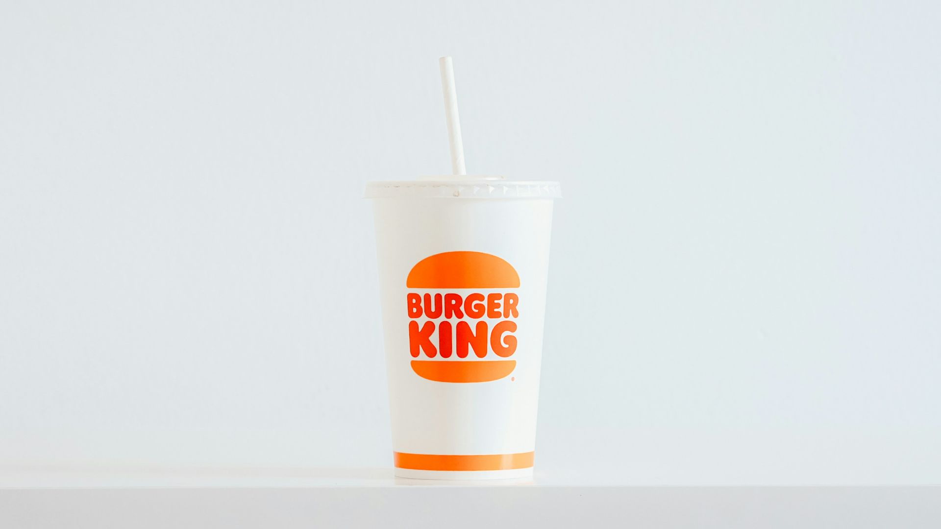 A cup with a straw sticking out of it