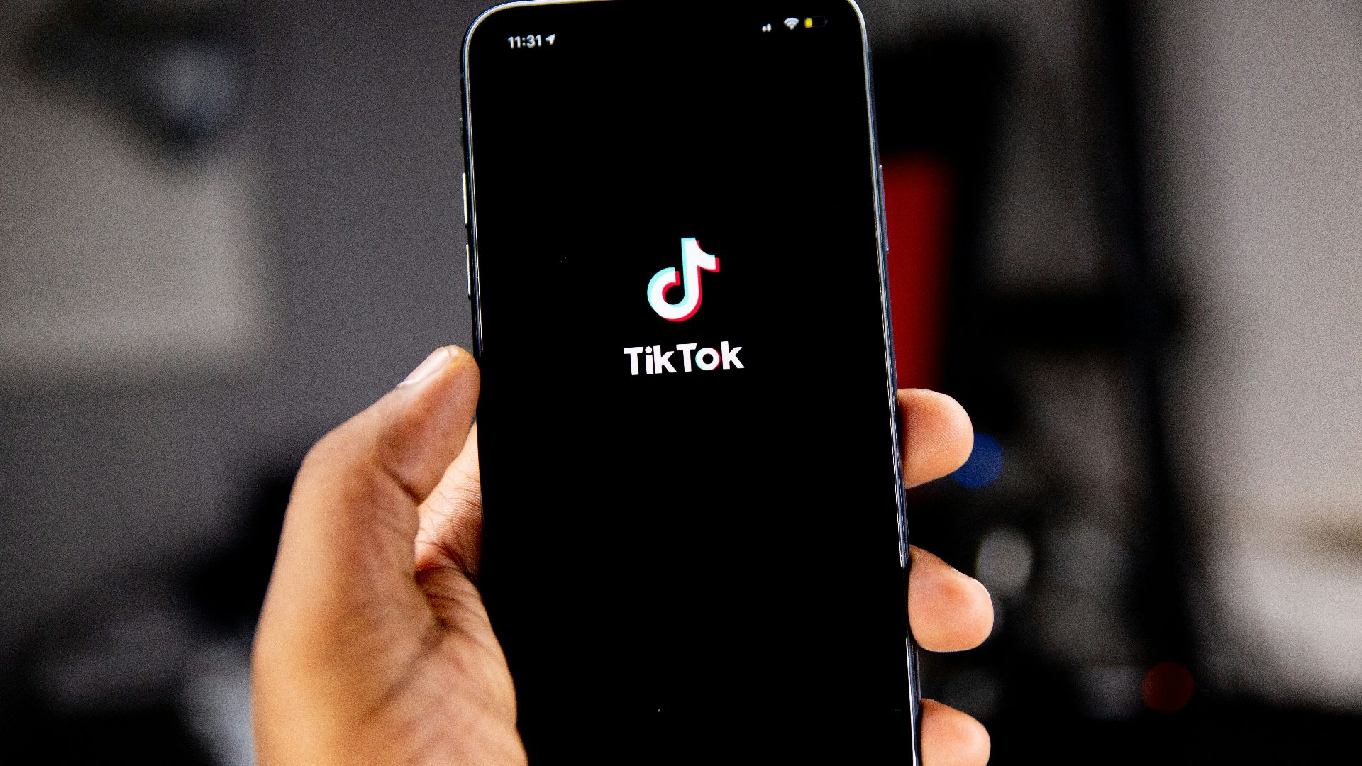 person holding black iphone 5