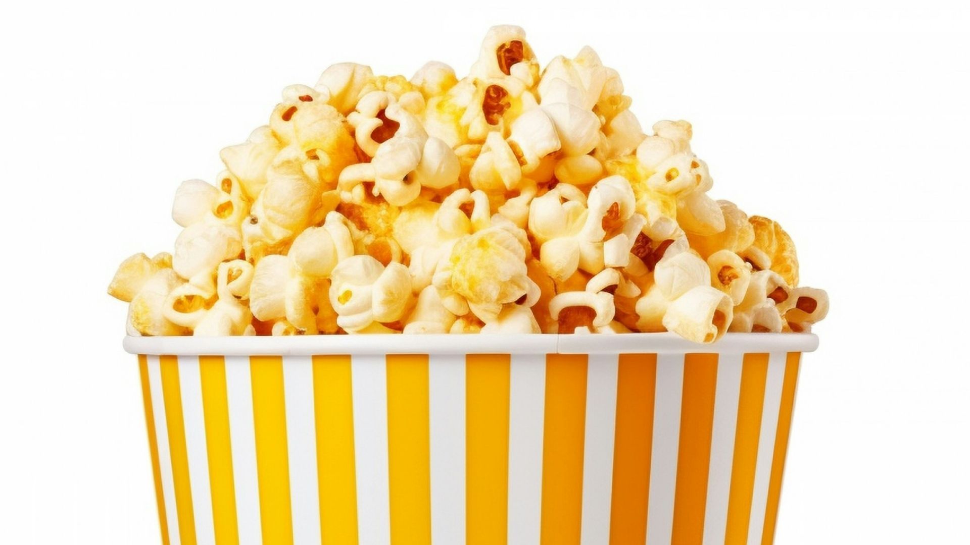 a yellow and white striped cup filled with popcorn