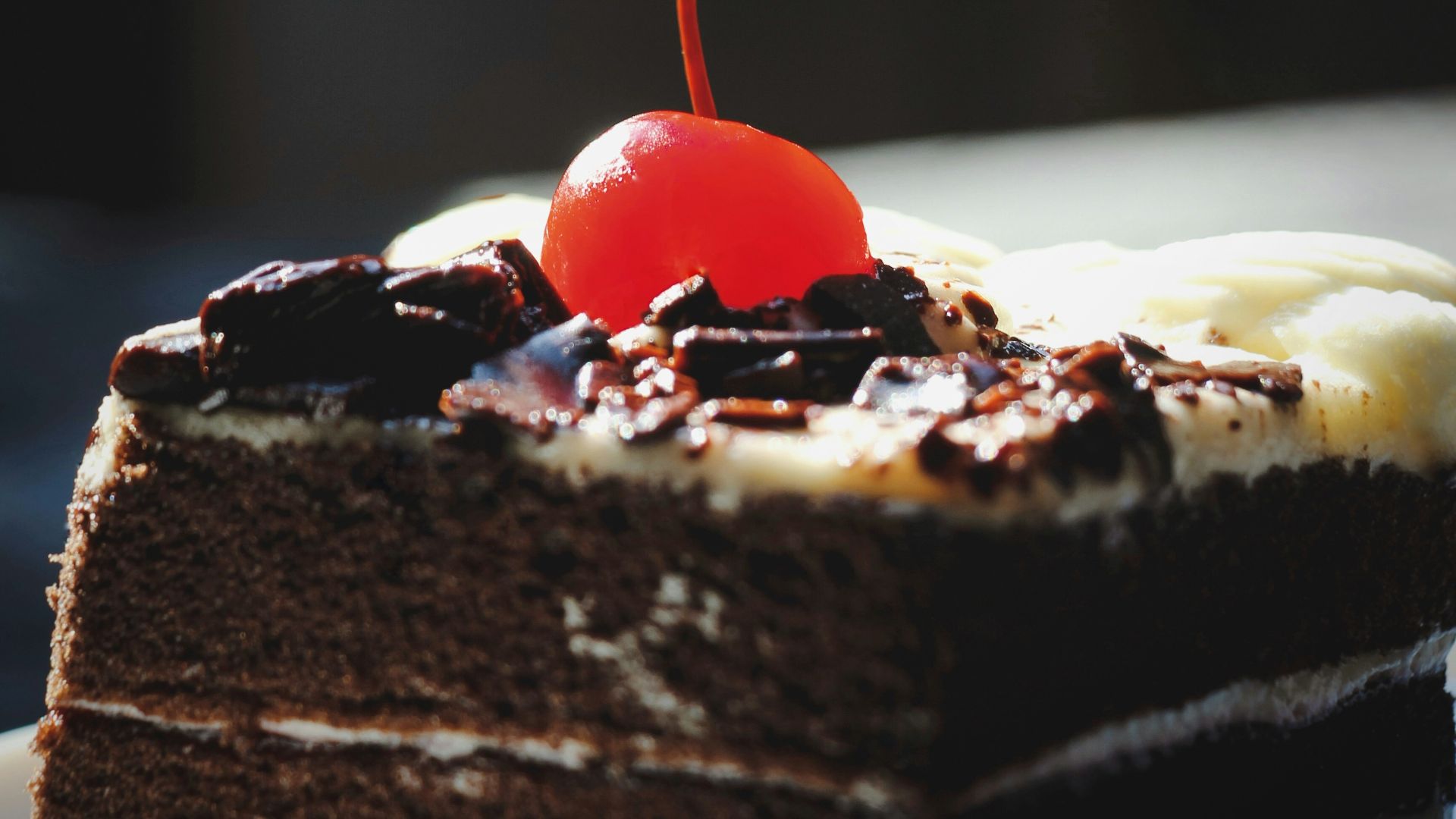 chocolate cake with cherry on top