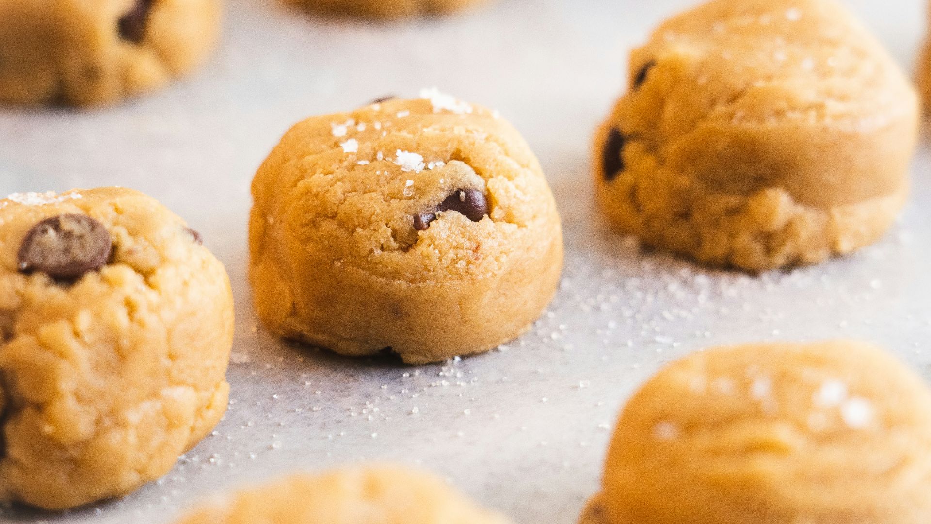 a close up of cookies on a baking sheet
