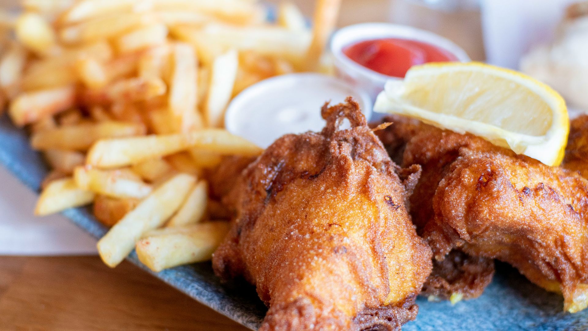 fried chicken with fries and sauce