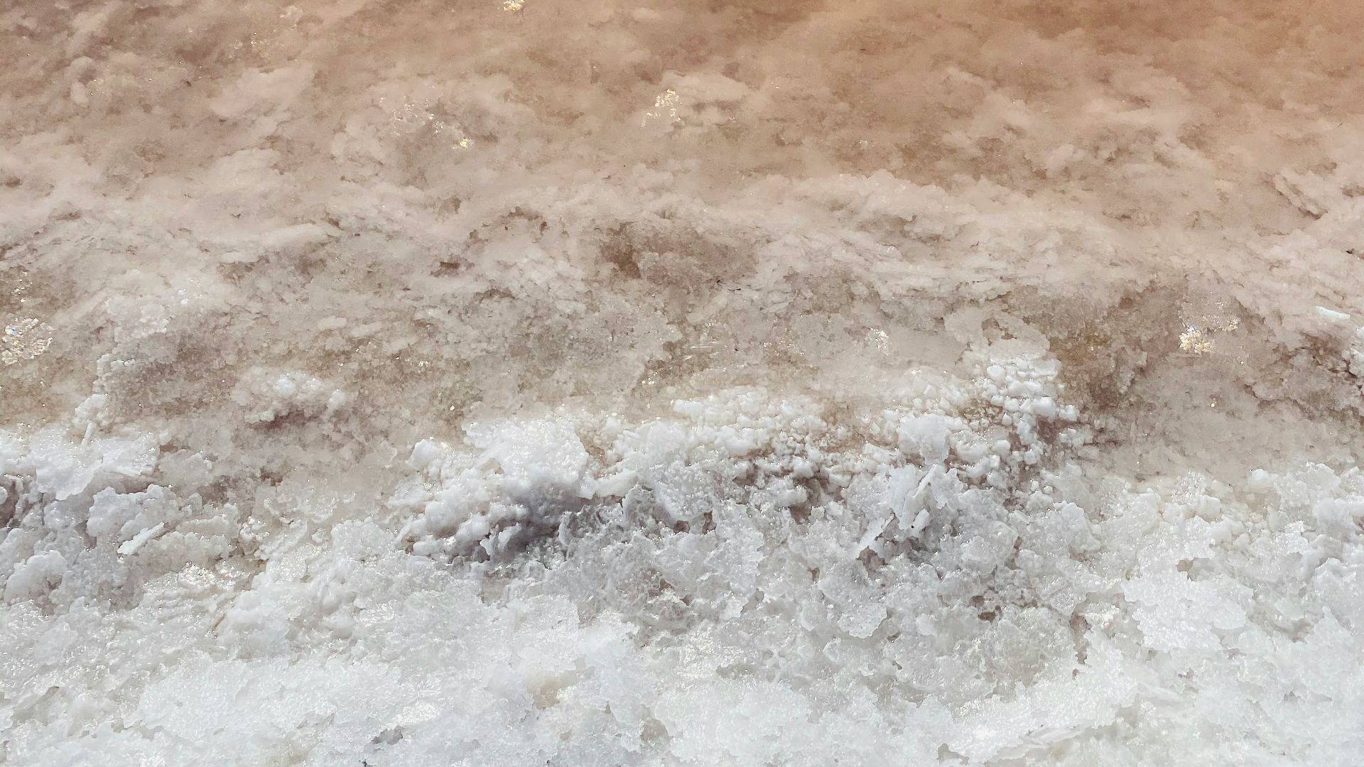 water waves on brown sand