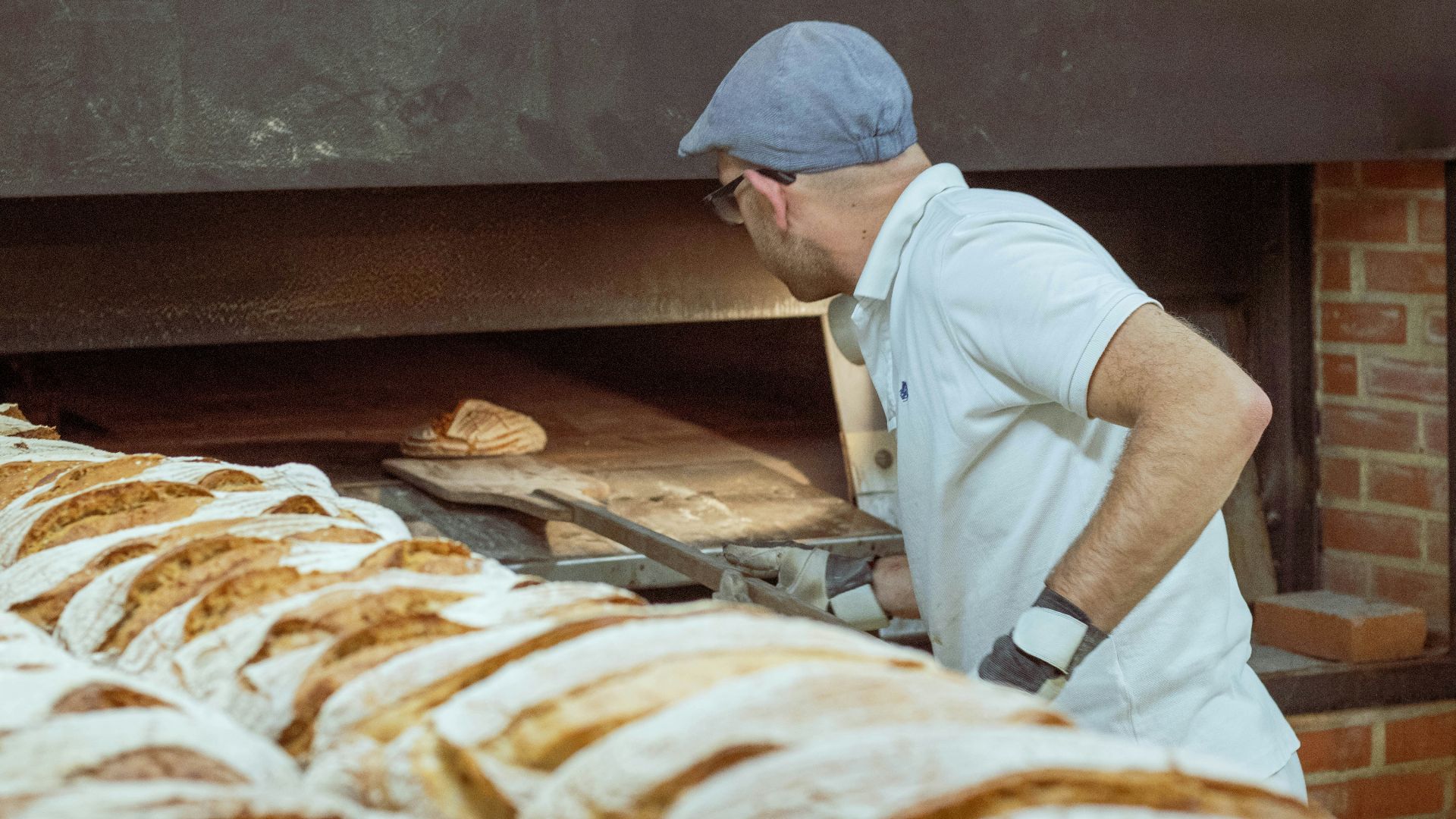 man wearing white polo shirt