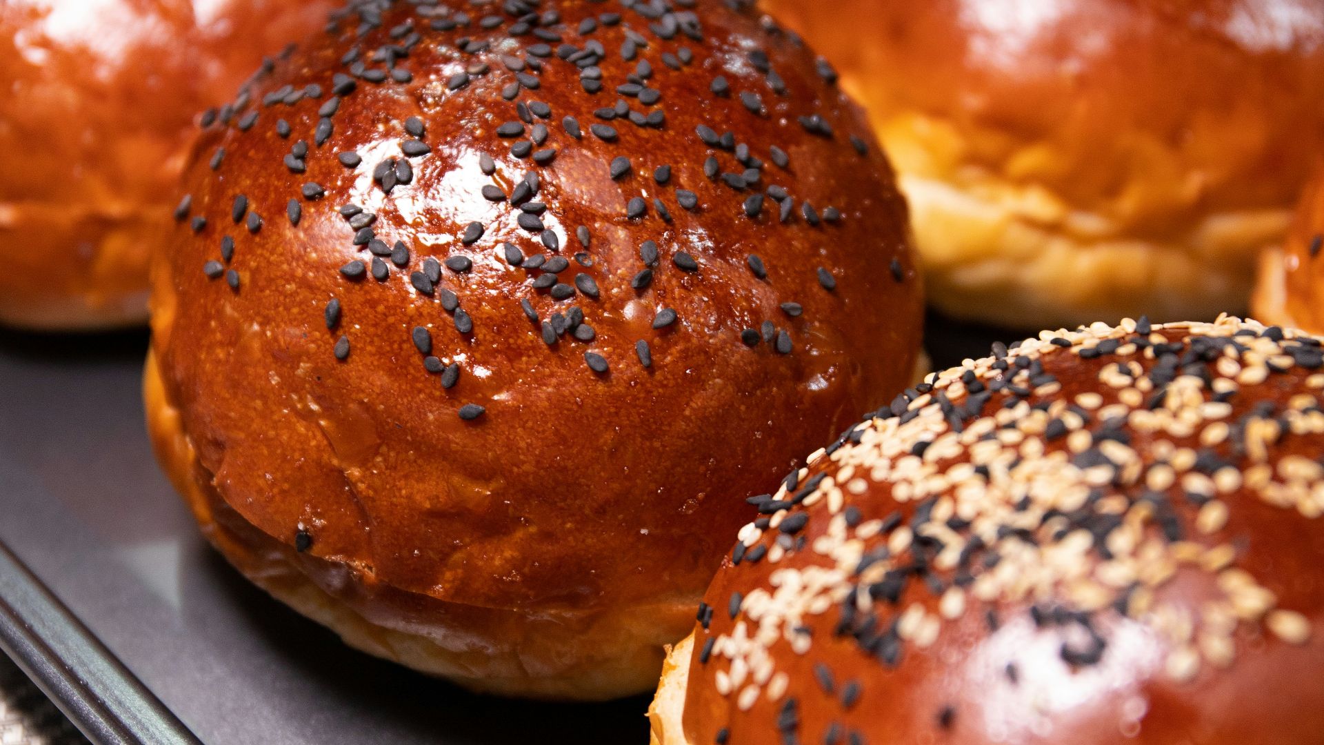 a close up of a tray of buns