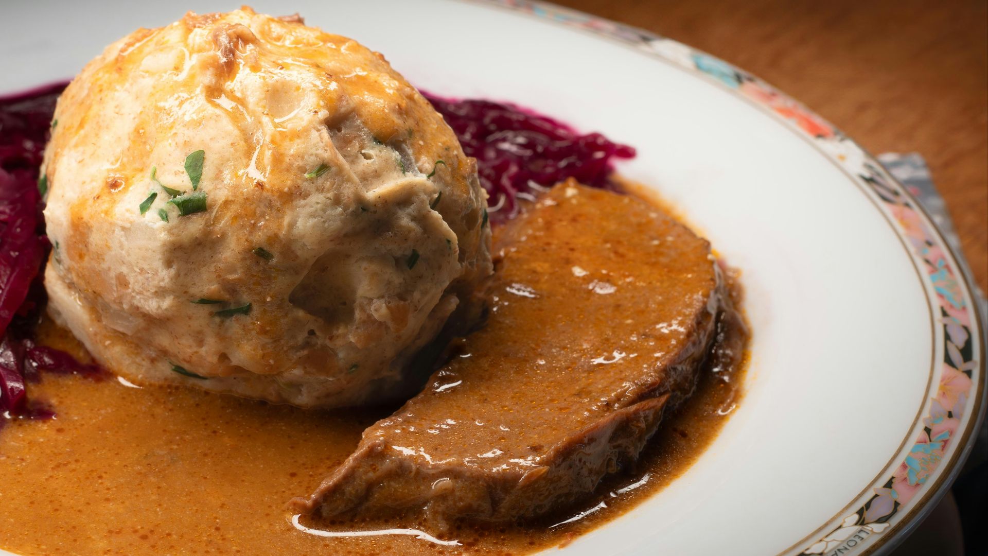 a plate of food on a wooden table
