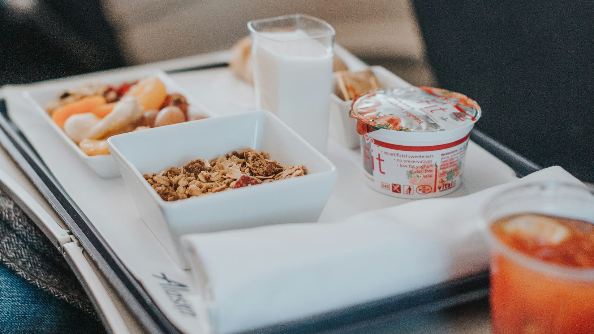 red liquid on cup beside bowl
