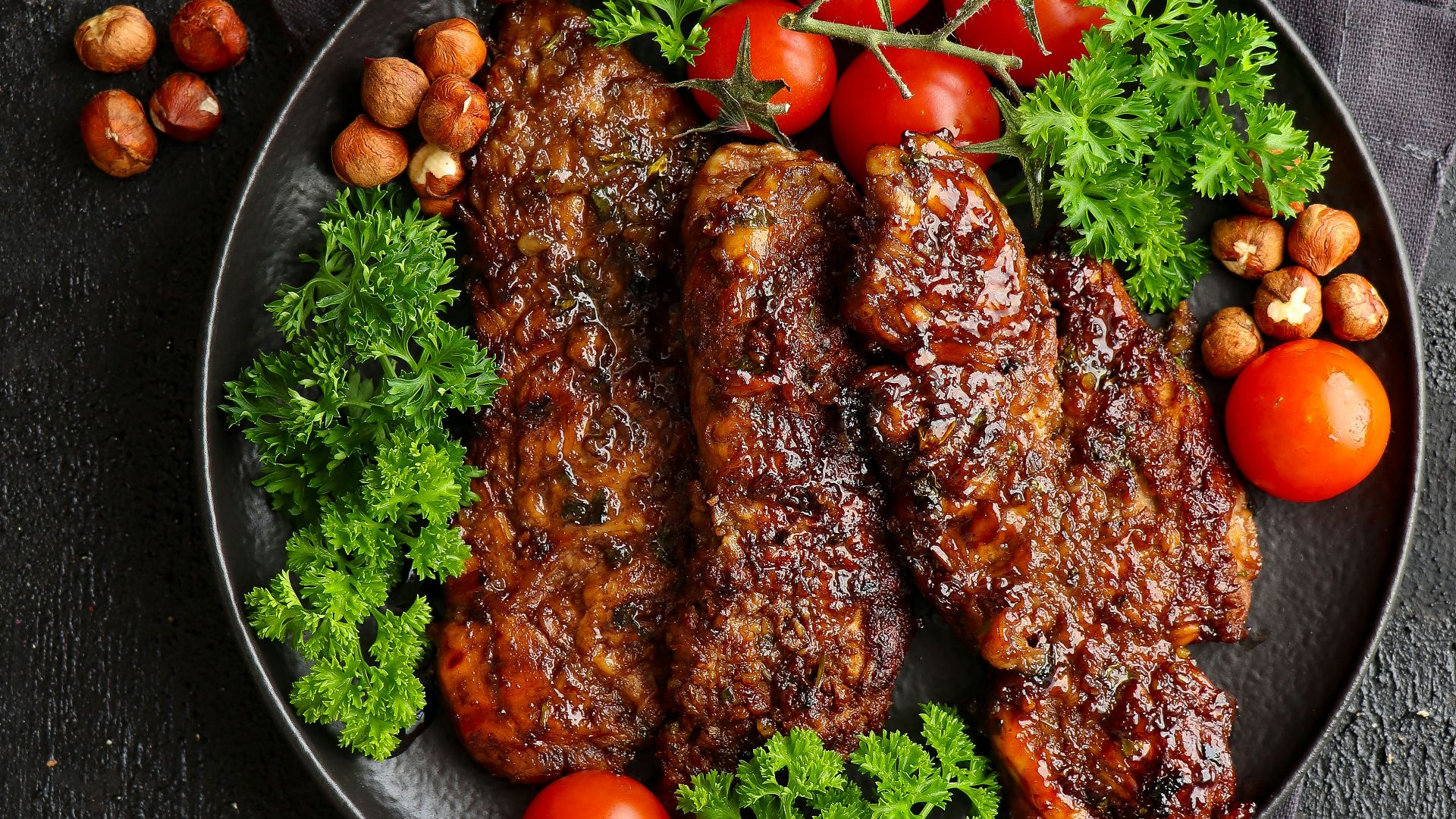 a plate of meat and vegetables on a table