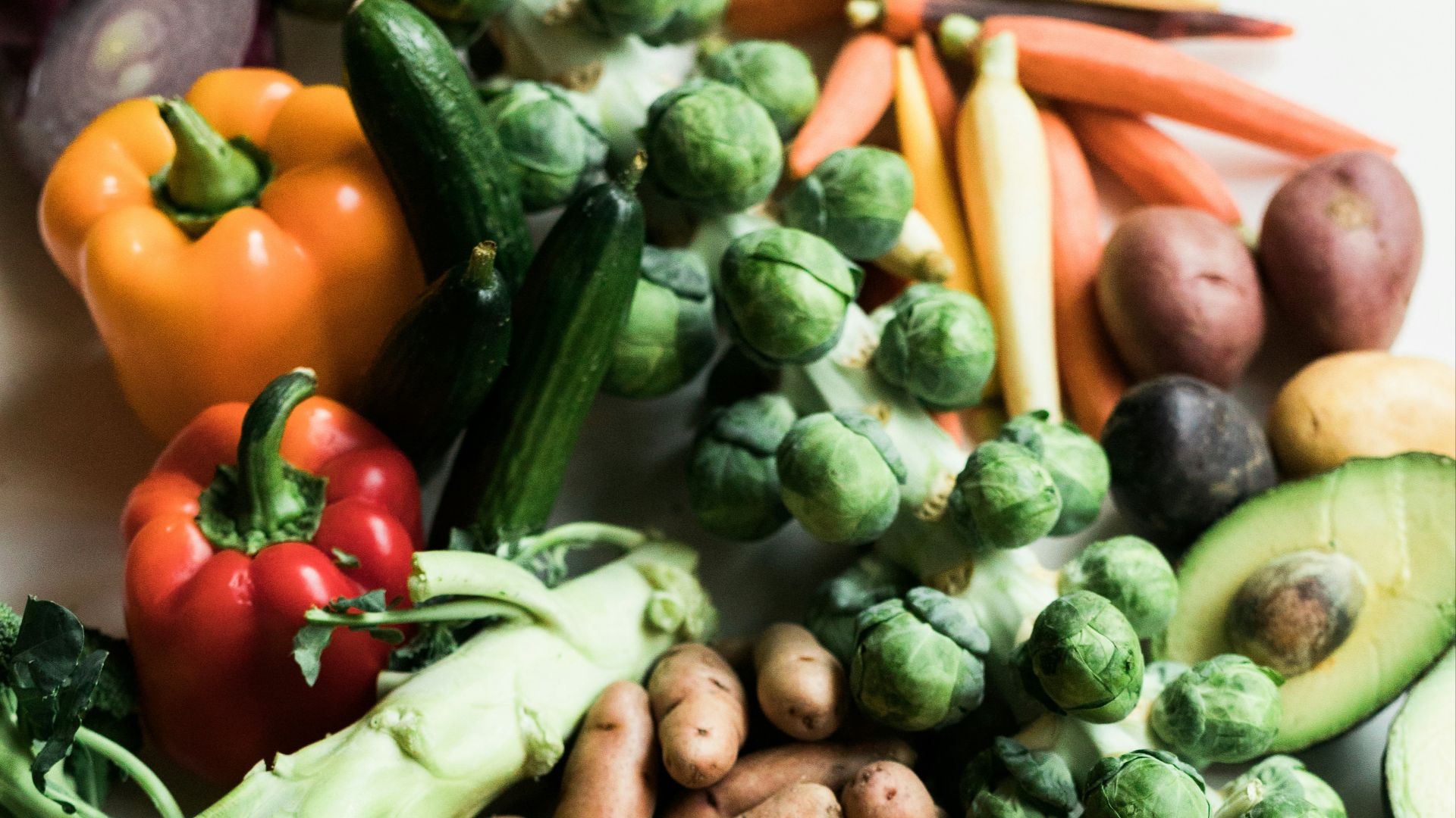 sliced carrots and green vegetable