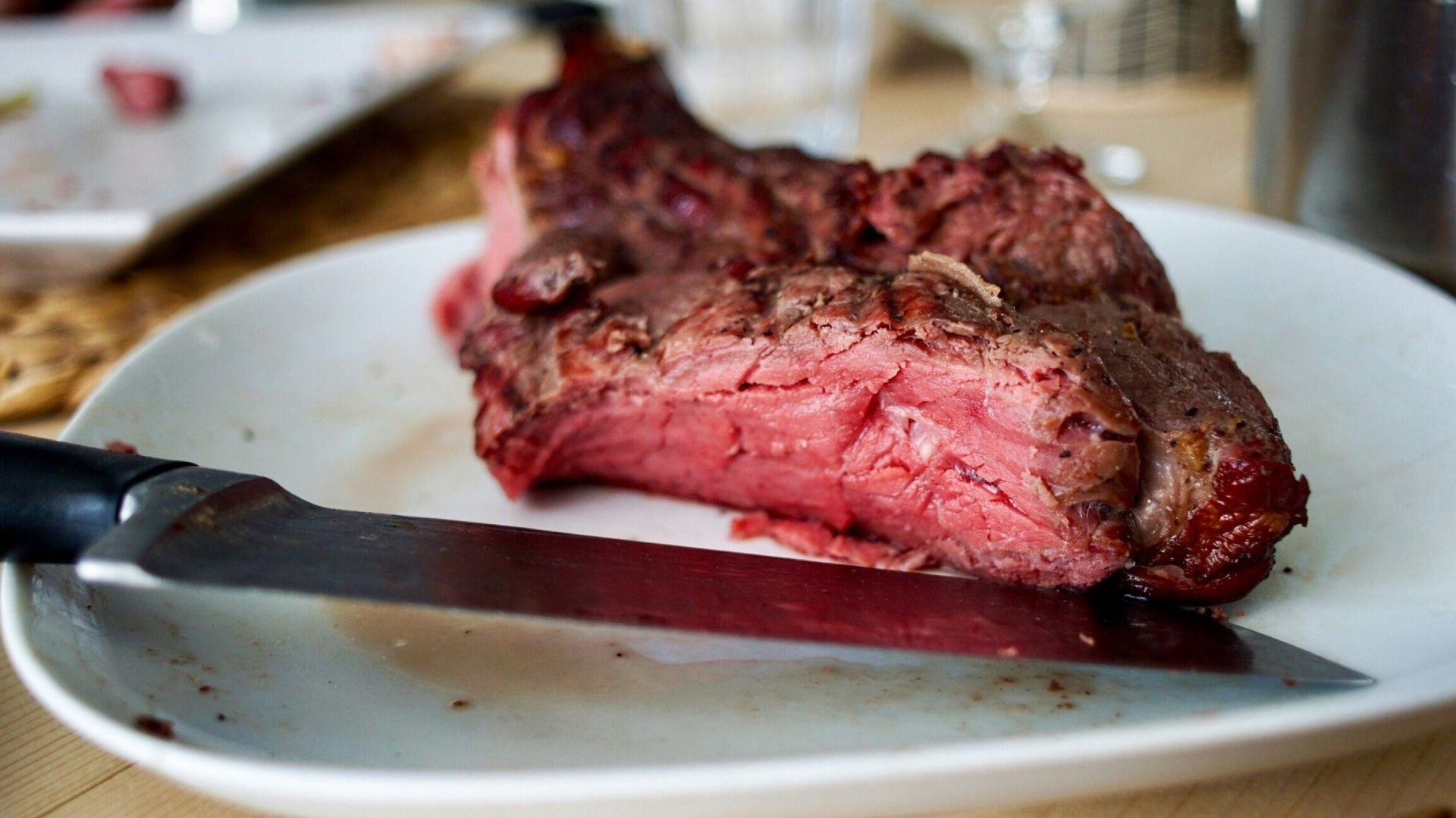 raw meat on white plate
