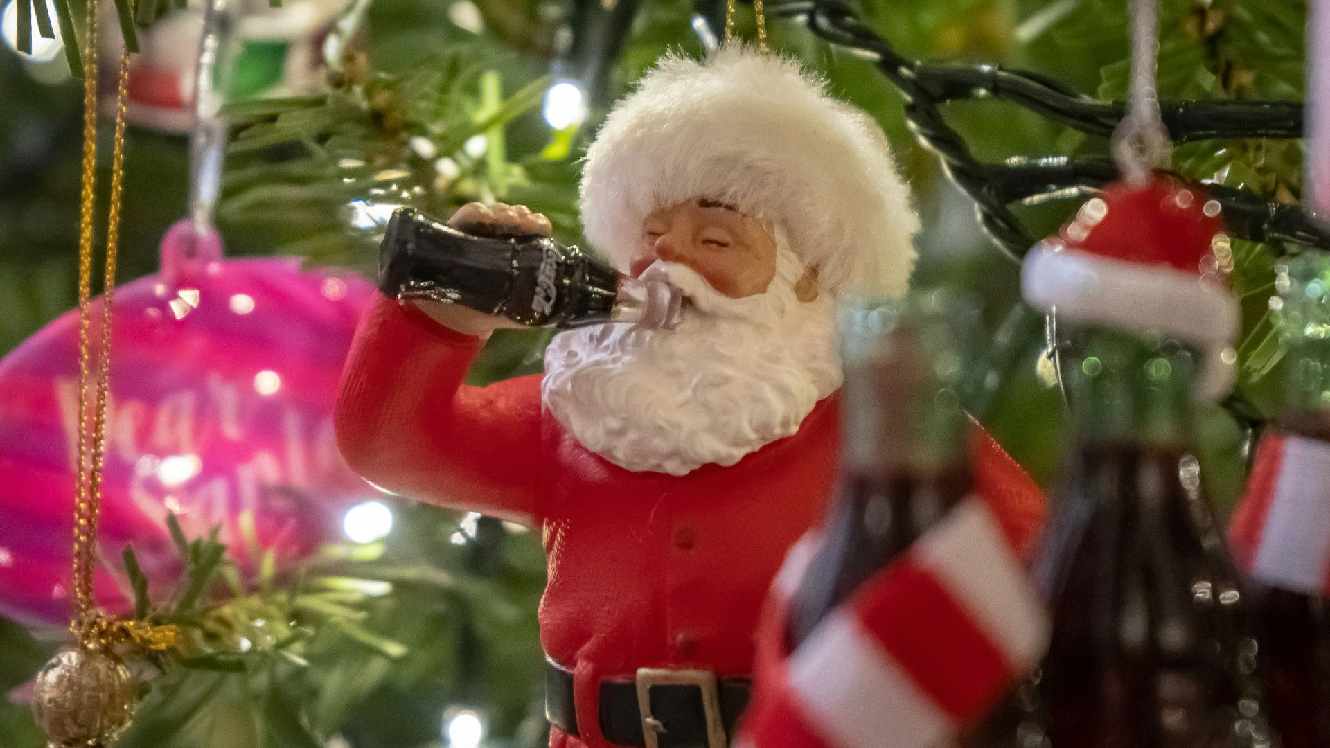 Santa drinking soda ornament