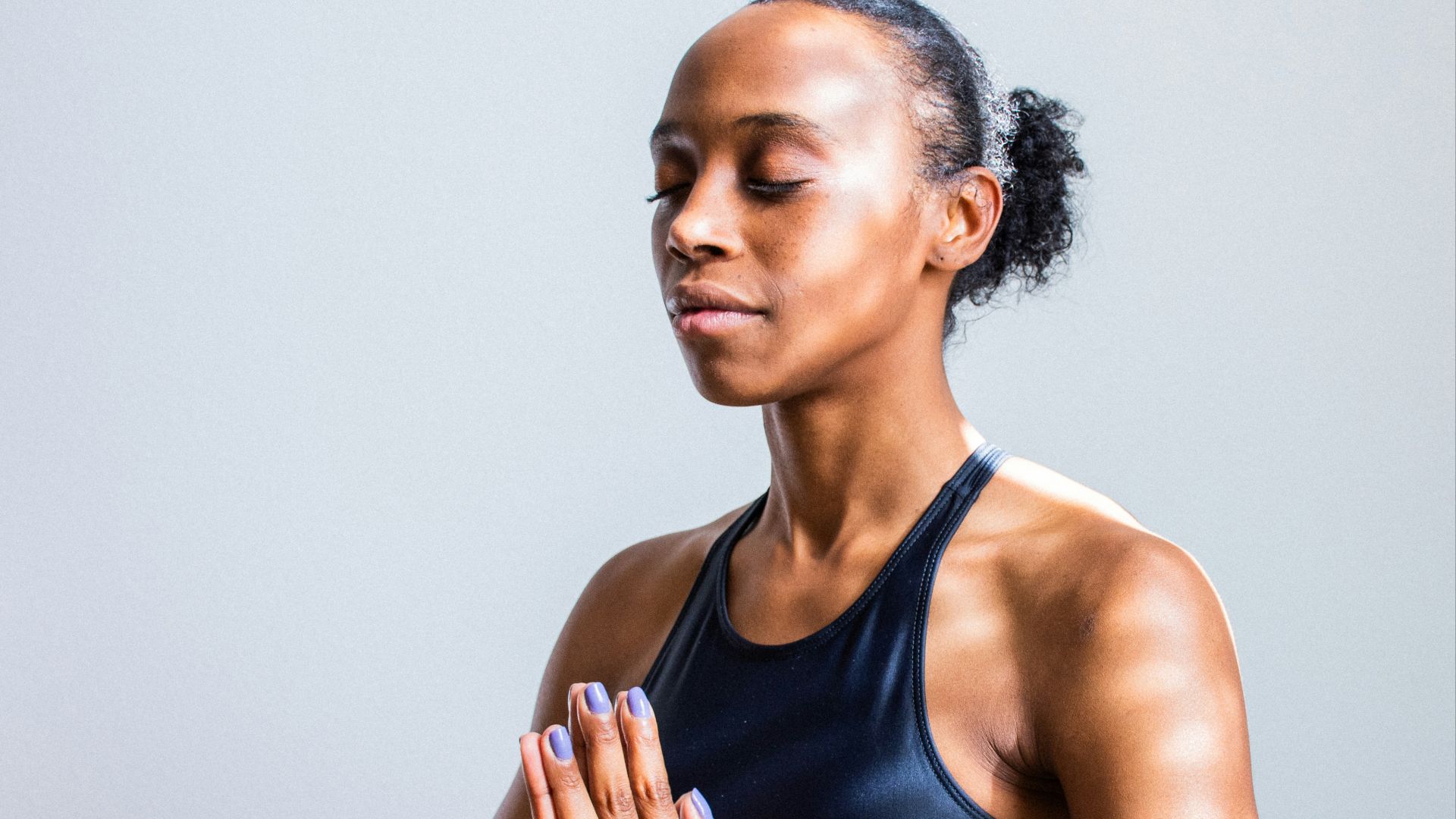 woman wearing black sports bra