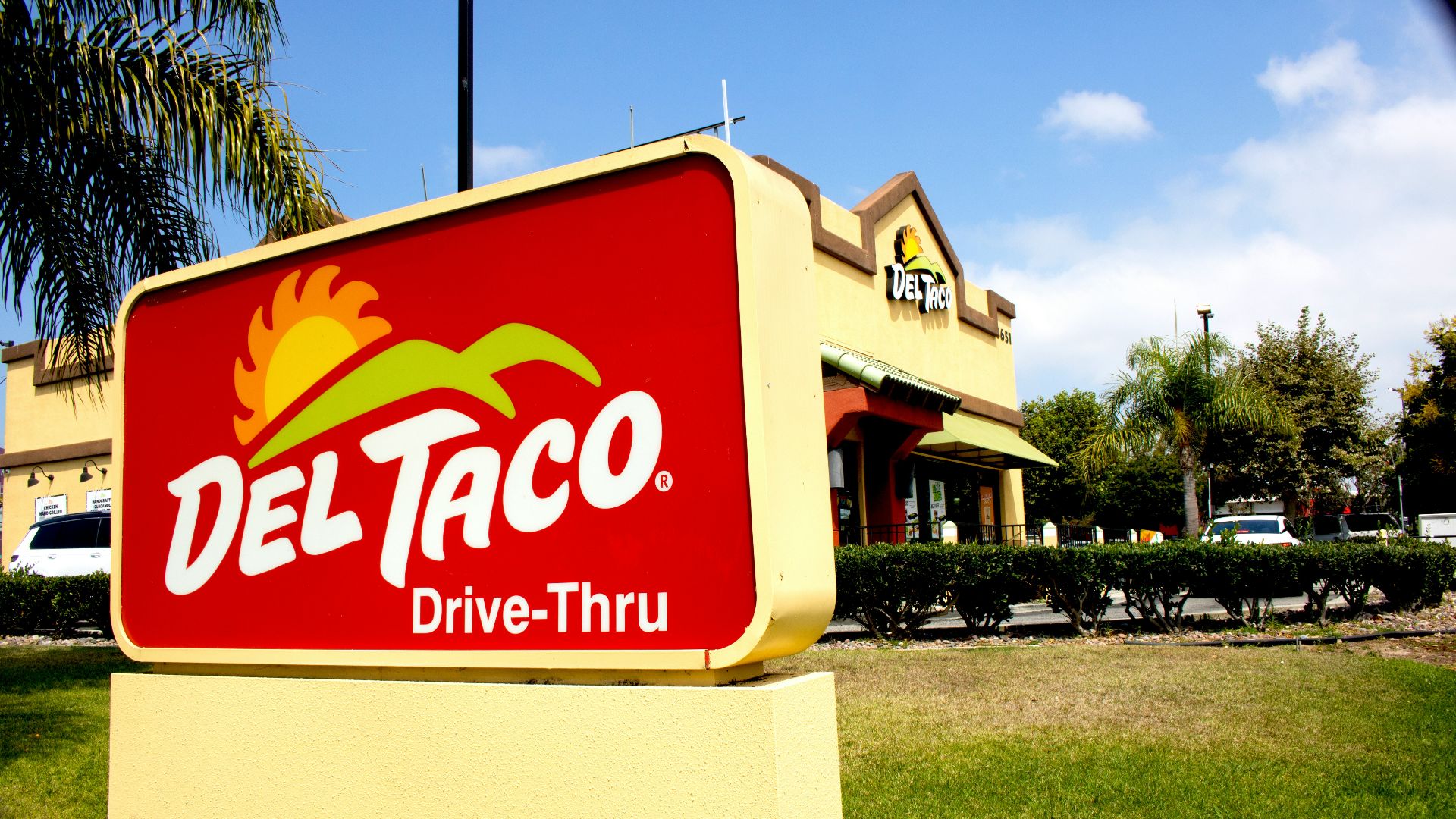 Deltaco restaurant exterior with a large sign.