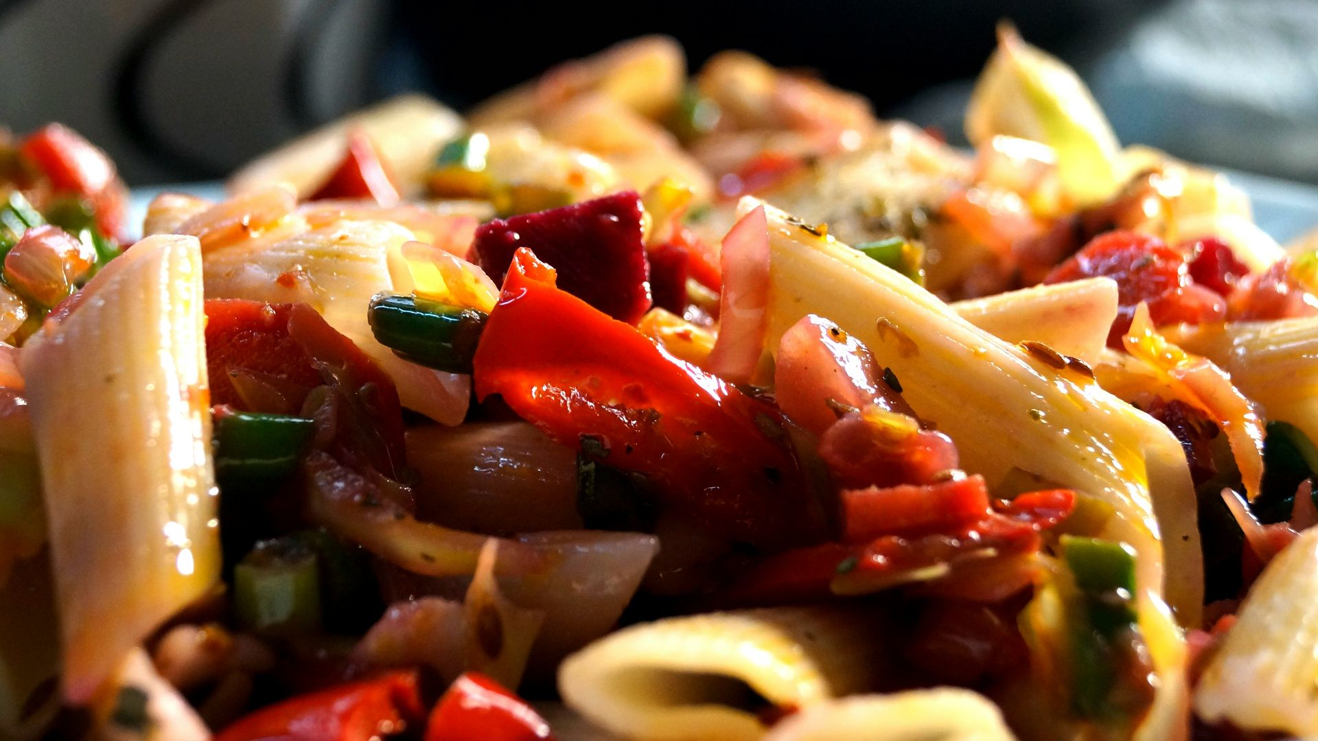 food photography of cooked pasta with slice of ehrbs