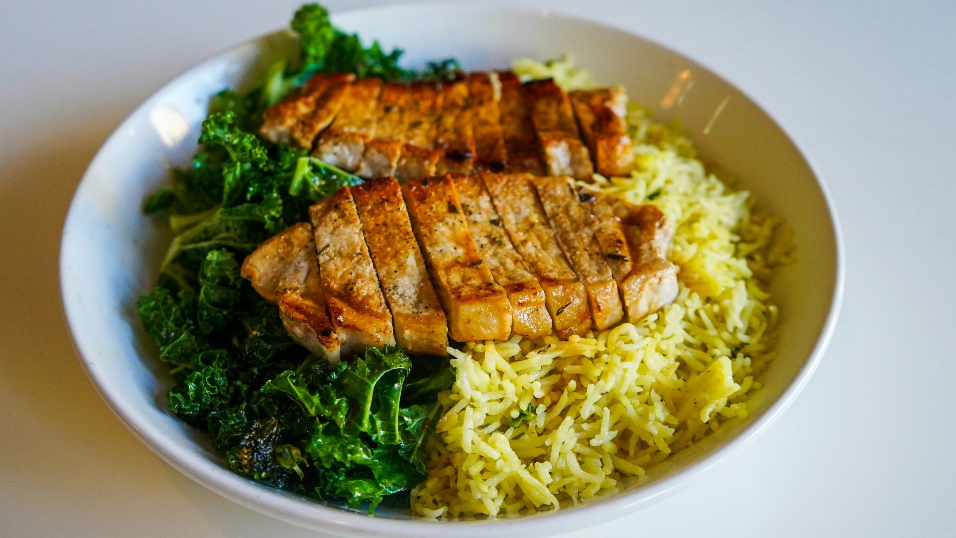 pasta with meat on white ceramic plate