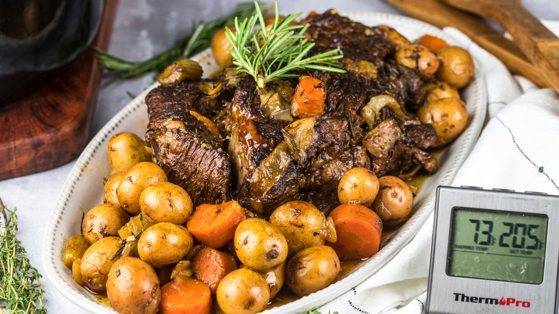 grilled meat with green vegetable on white ceramic plate