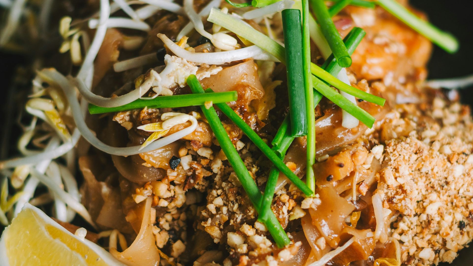 a plate of food on a wooden table