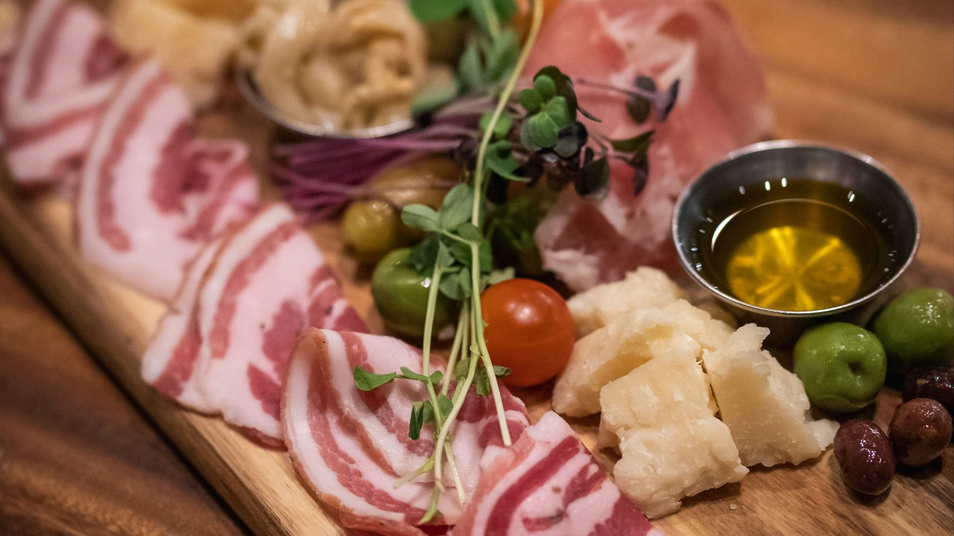 raw meat on brown wooden chopping board