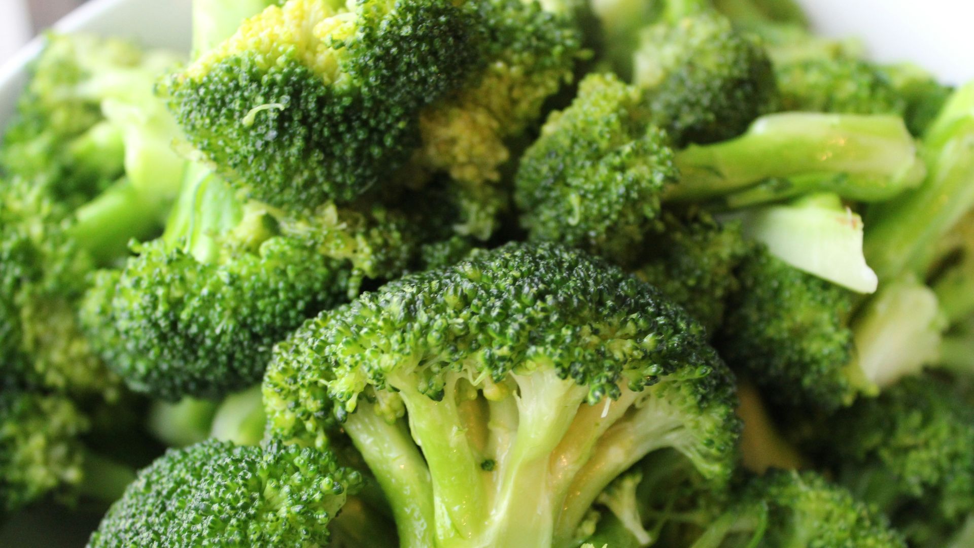 green broccoli on white ceramic plate