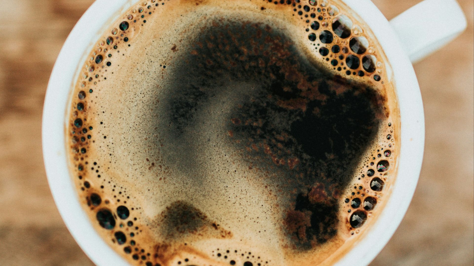 white ceramic mug filled with coffee
