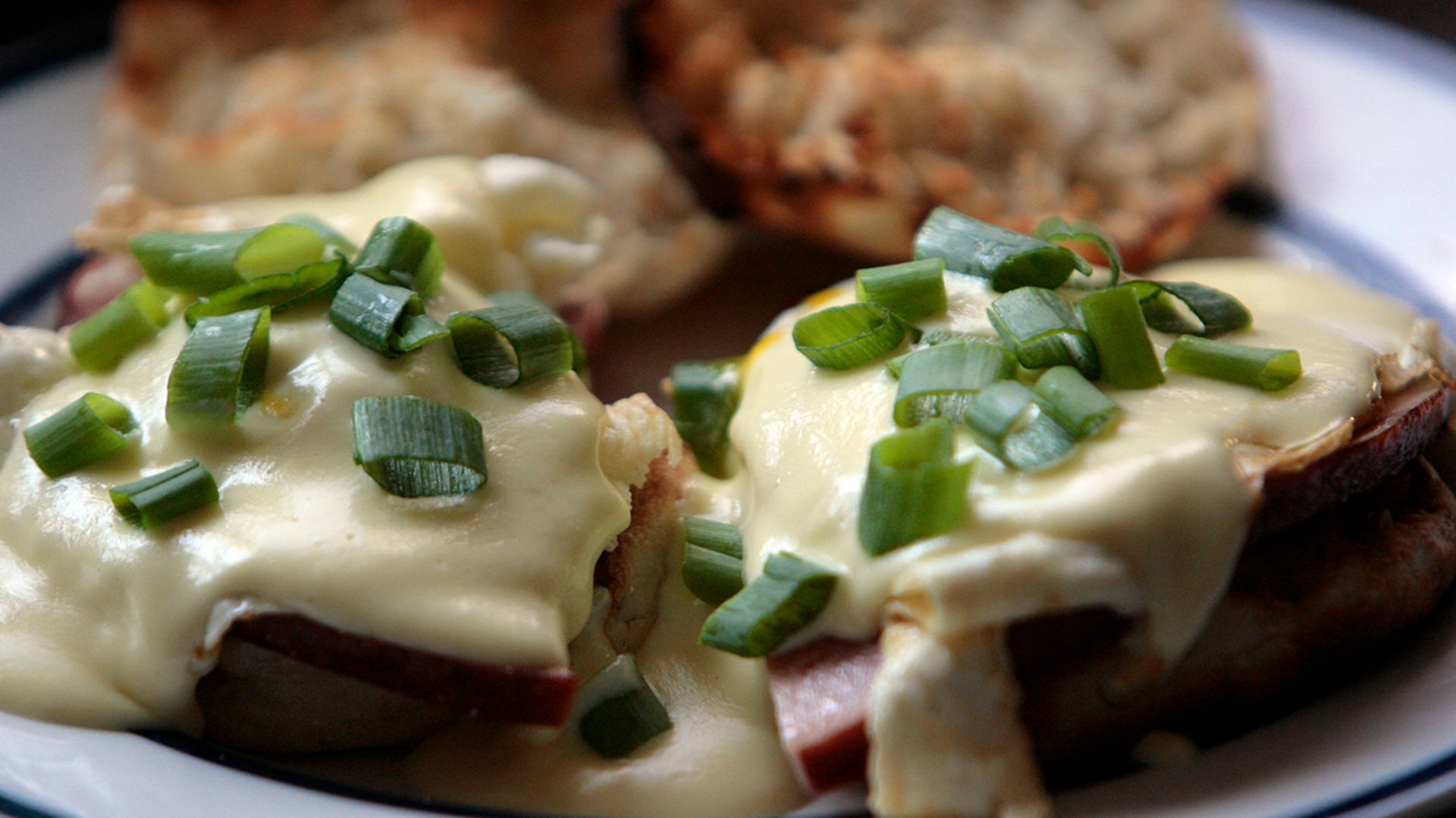 a plate of food with meat and cheese on it