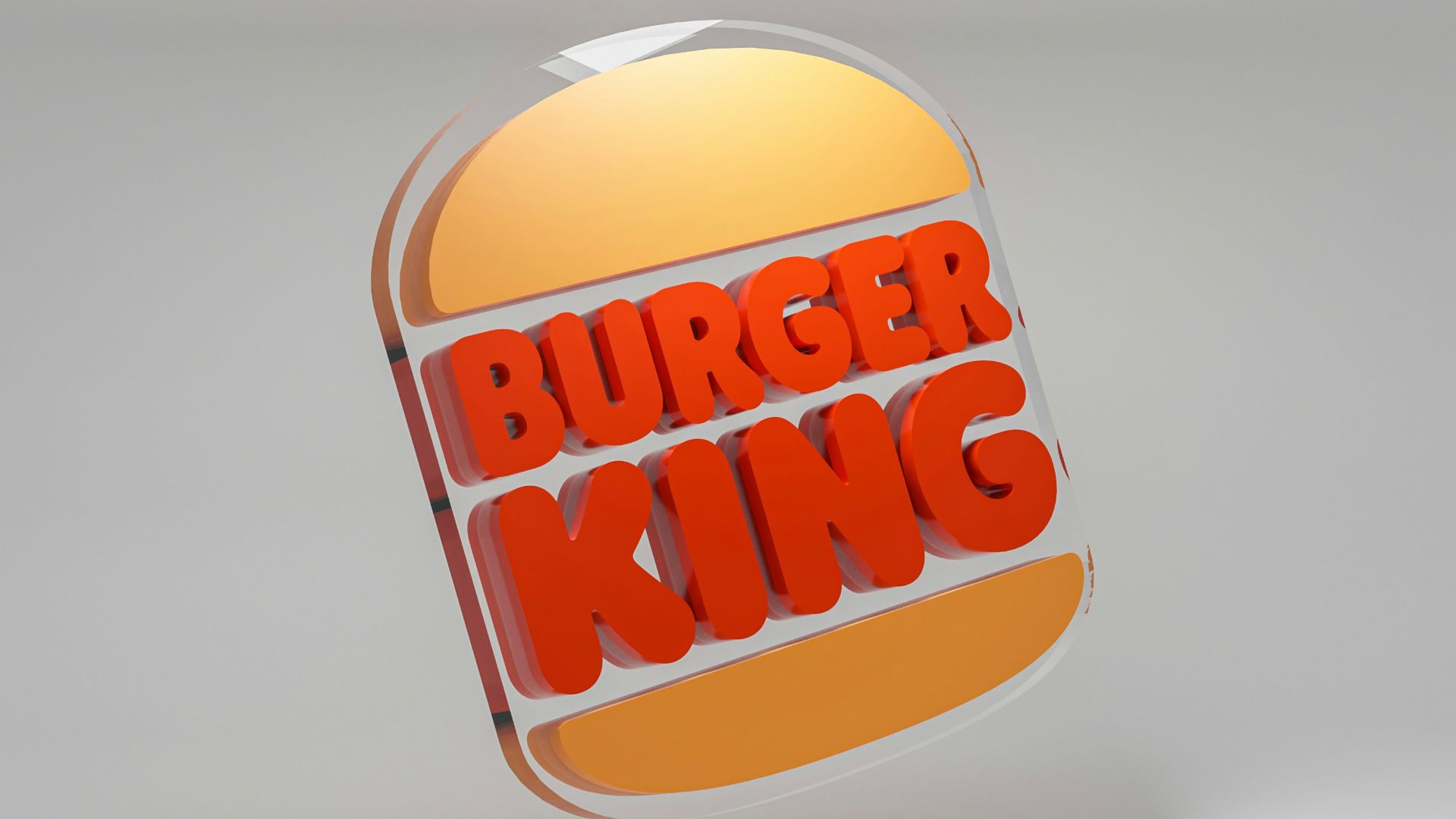 a burger king logo is shown on a gray background