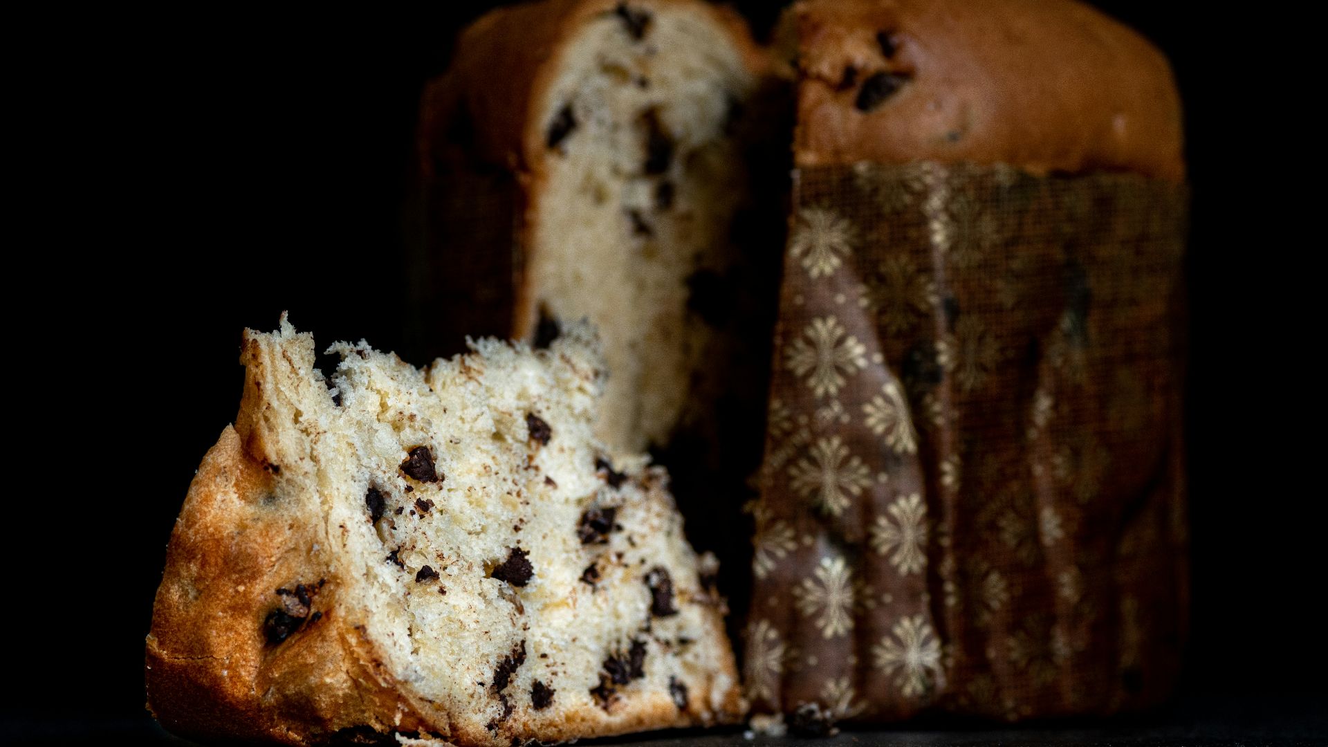 a loaf of bread with a bite taken out of it