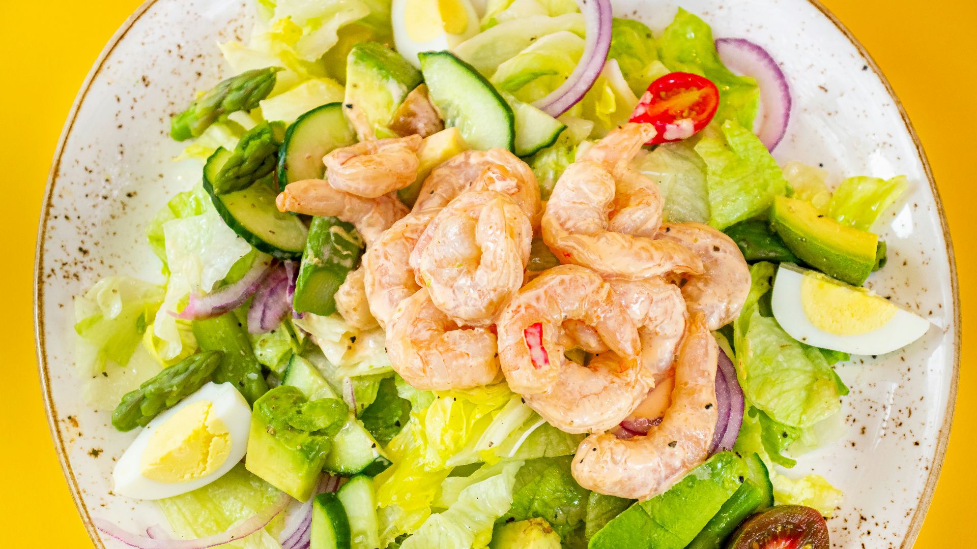 a plate of seafood and vegetables