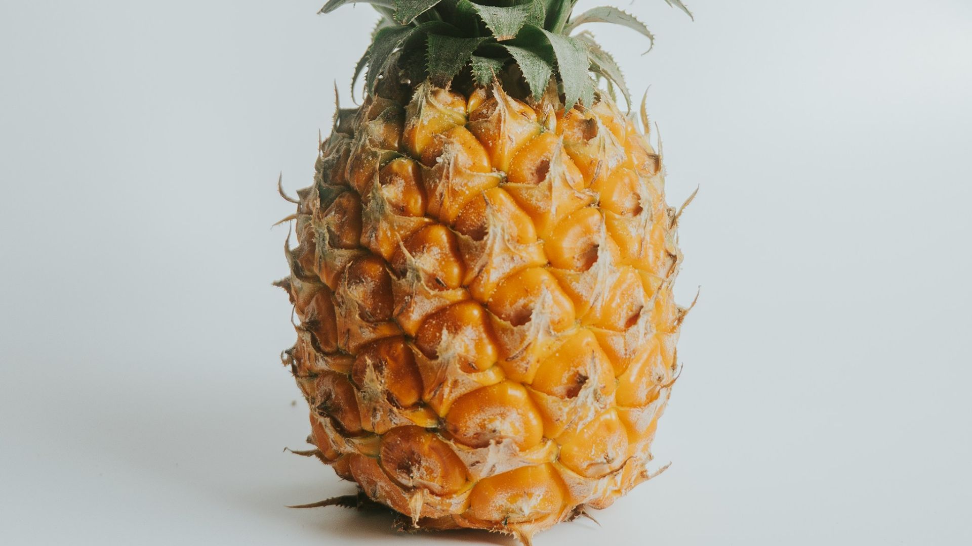 pineapple fruit on white table