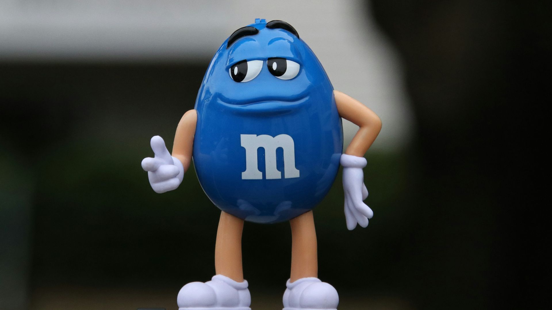 a close up of a toy figurine on a table