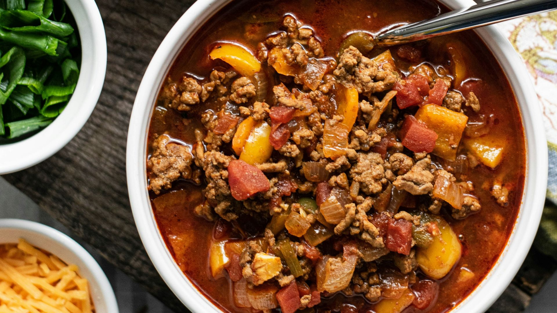 a bowl of soup with a spoon