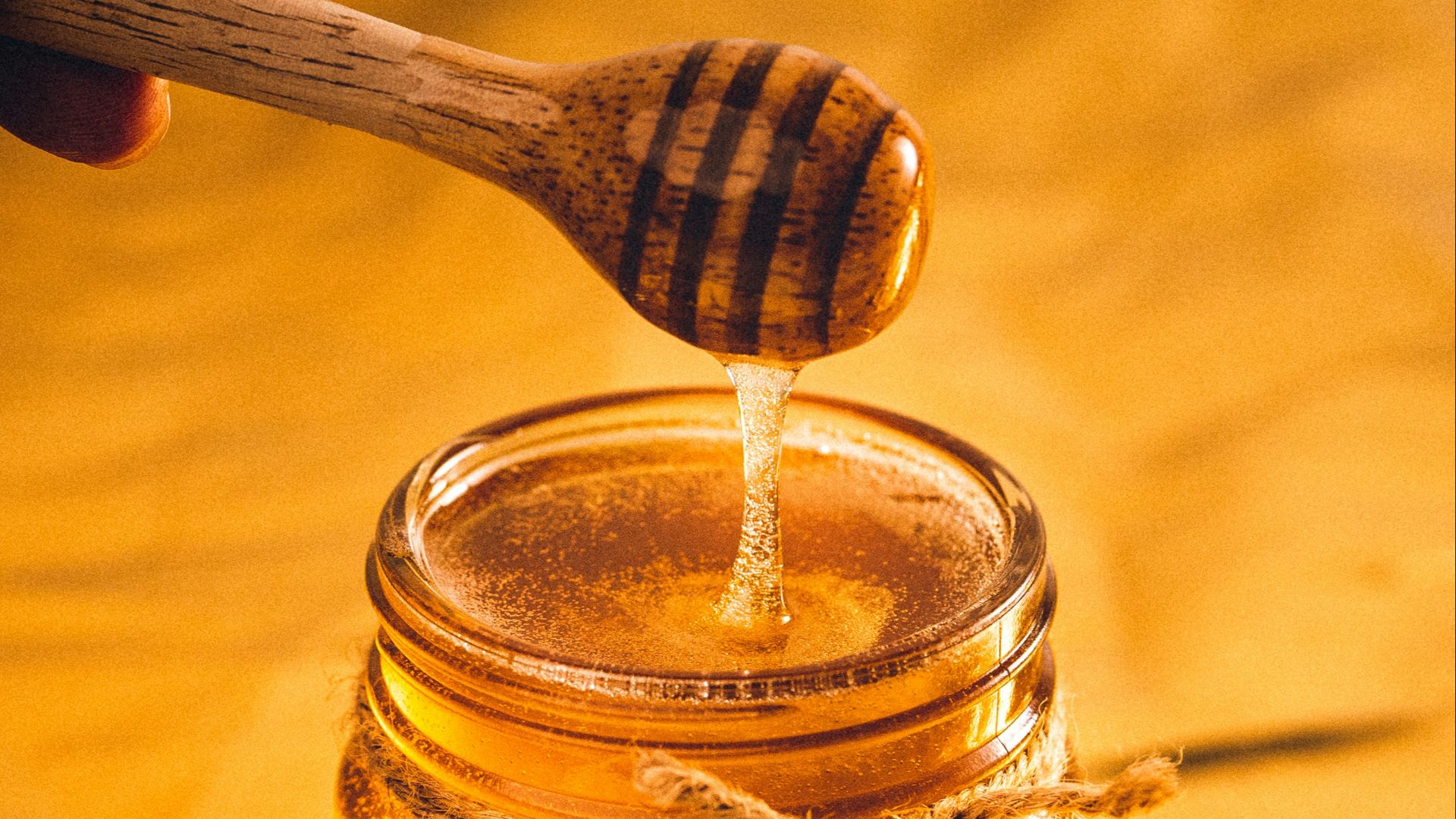 clear glass jar with brown liquid