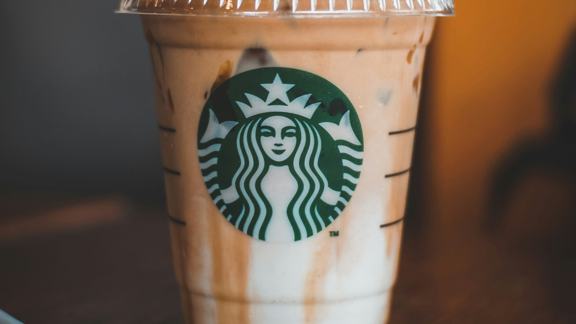 white and brown starbucks cup