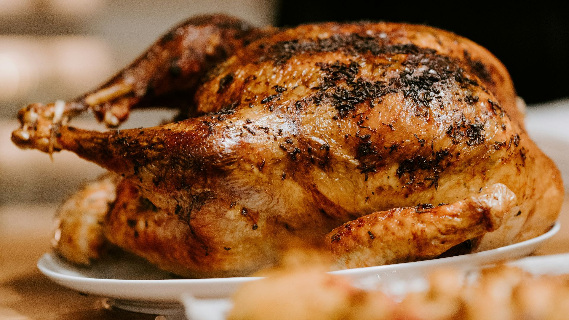 roasted chicken on white ceramic plate