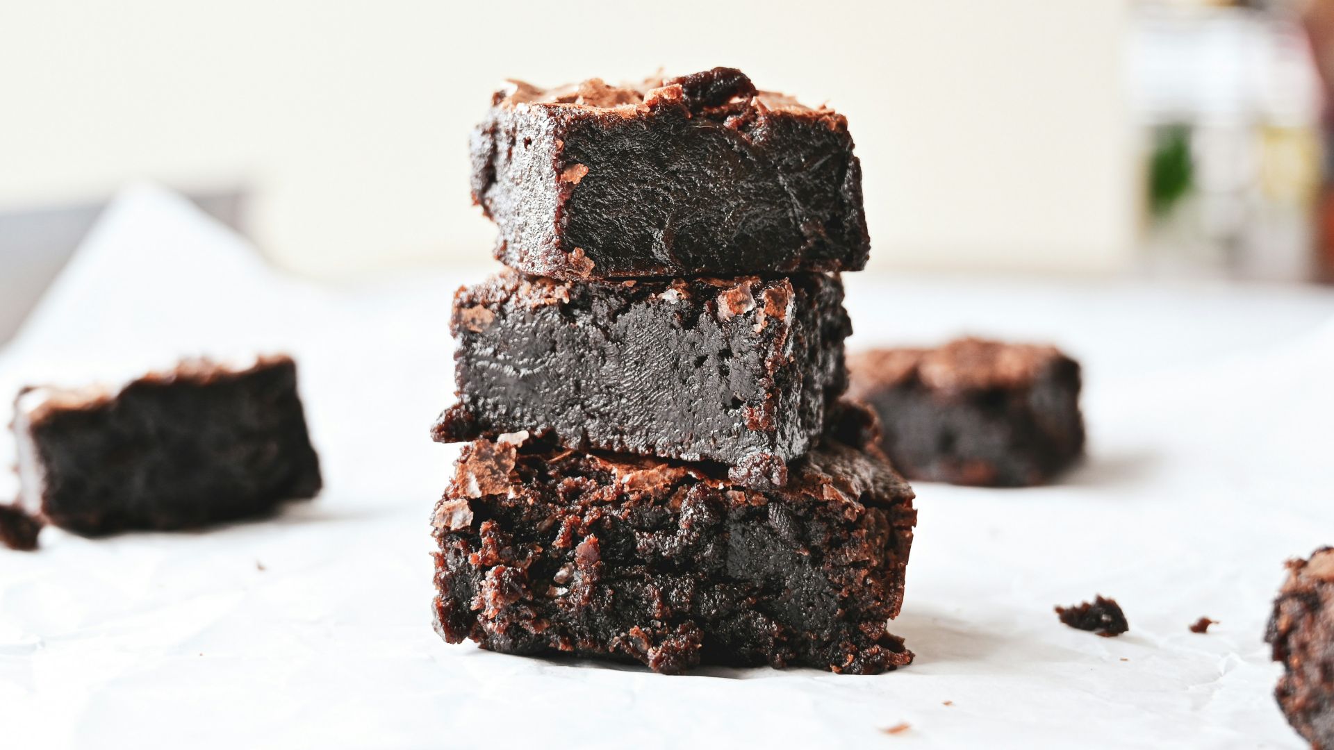 brown and black chocolate cake on white table