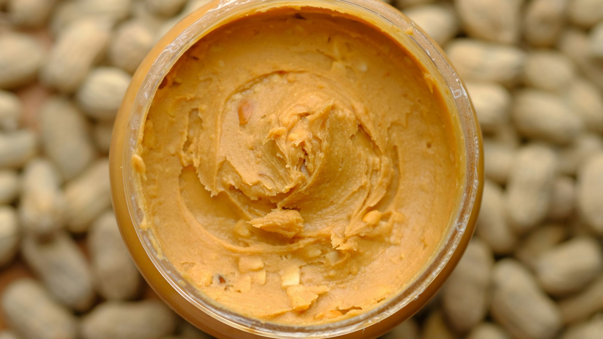 brown powder in brown round container