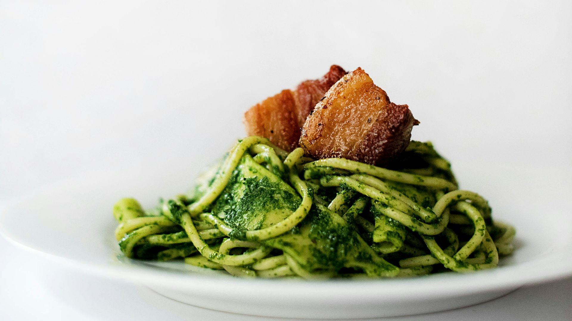 green vegetable on white ceramic plate