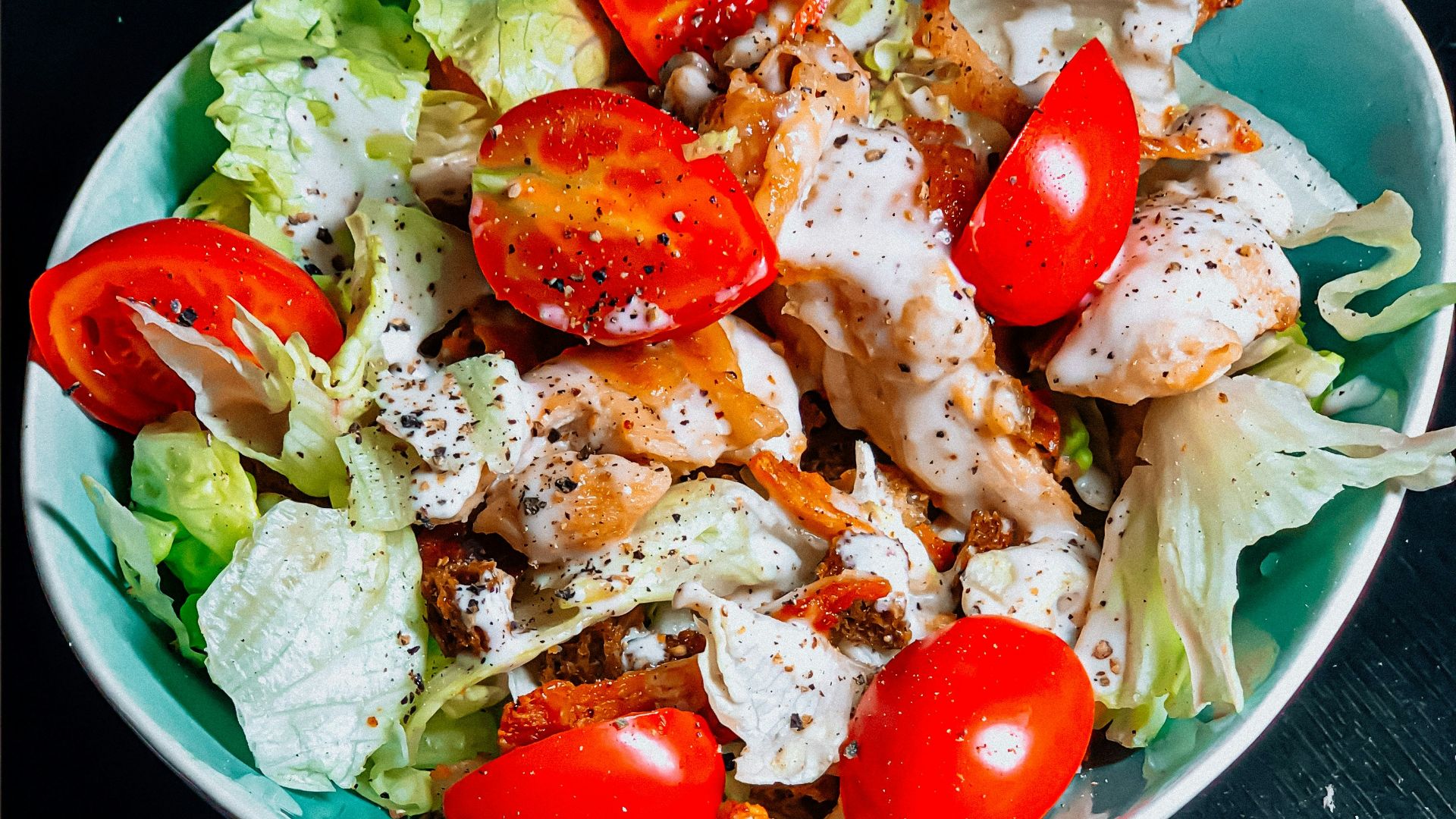 vegetable salad on blue ceramic bowl