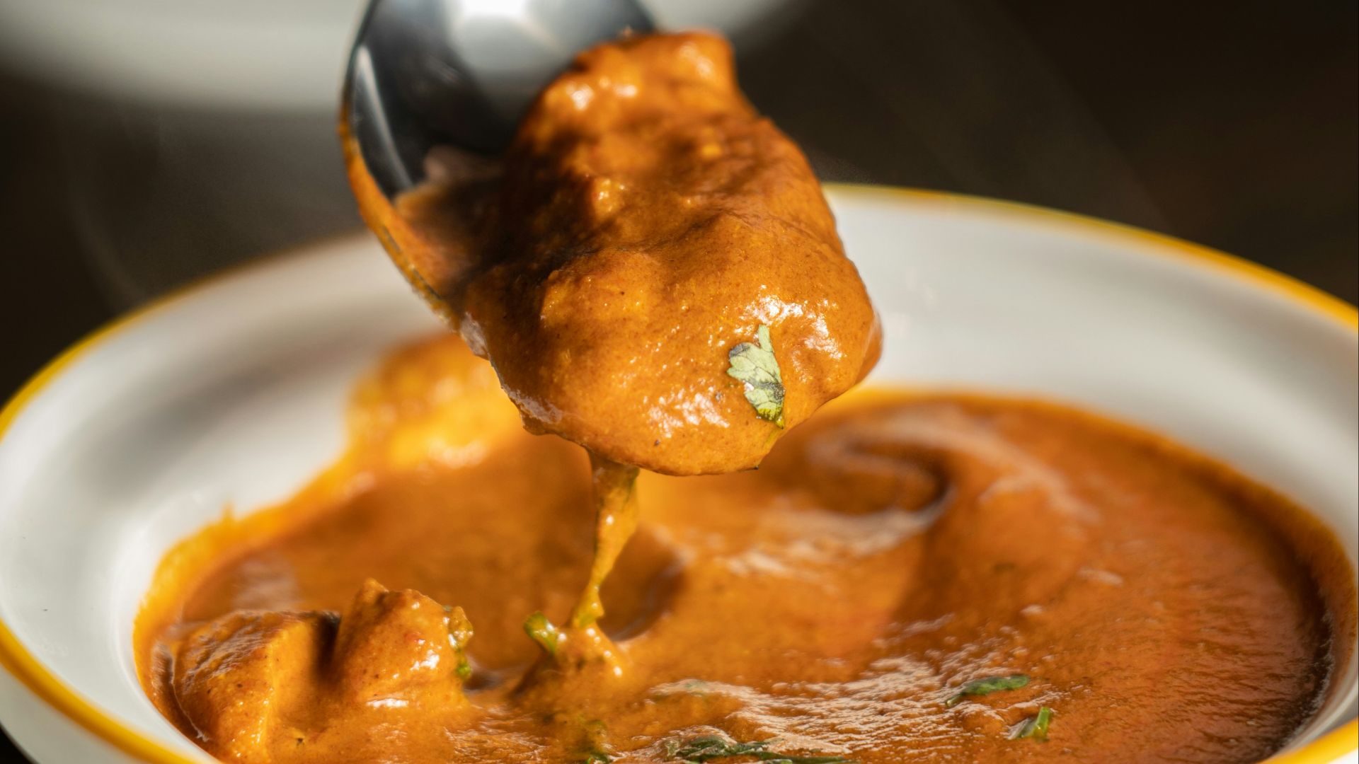 orange mushy dish in bow
