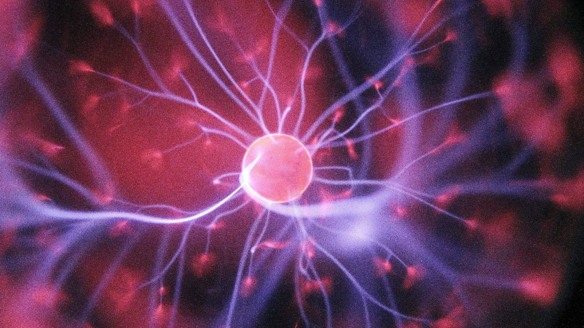 purple and pink plasma ball