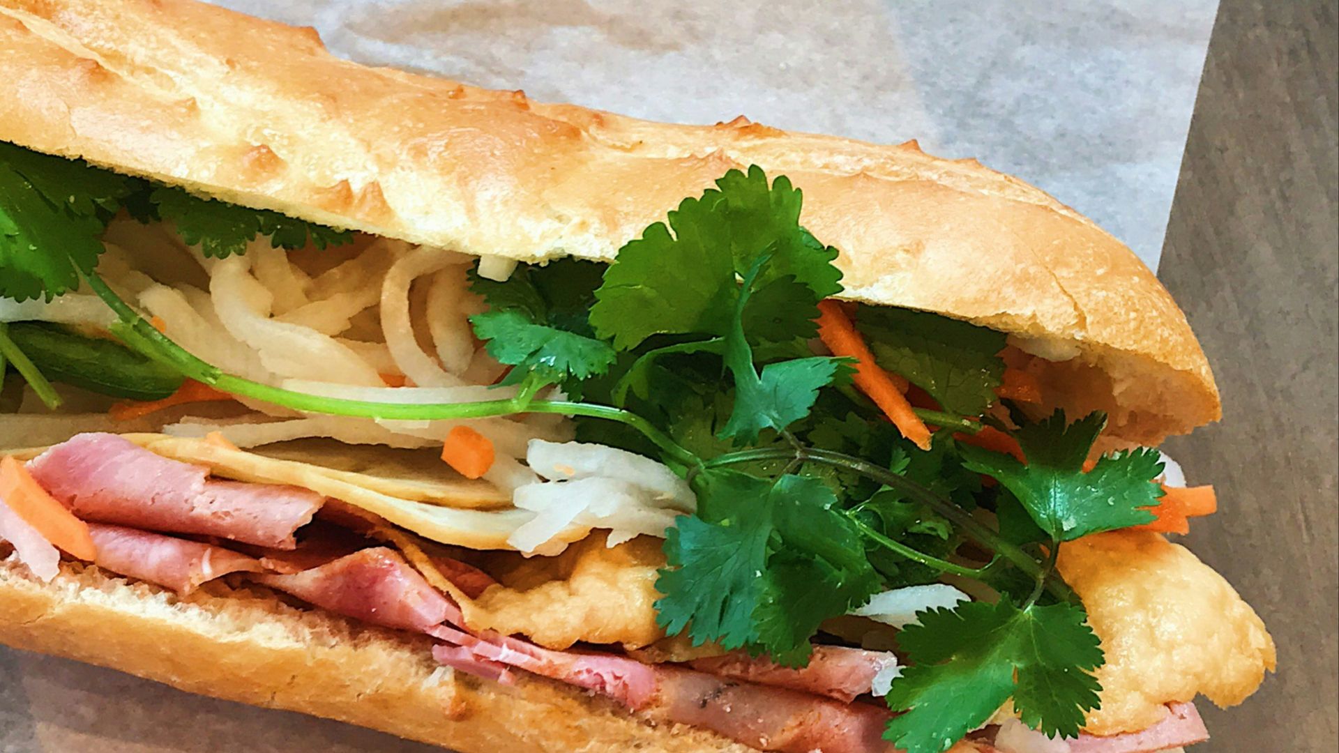 green vegetable on brown bread