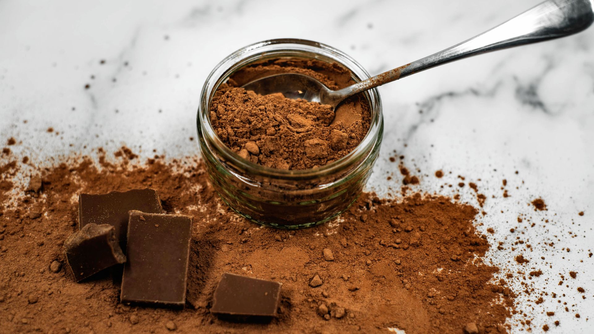 File:Cocoa Powder and Chocolate on Marble Background.jpg