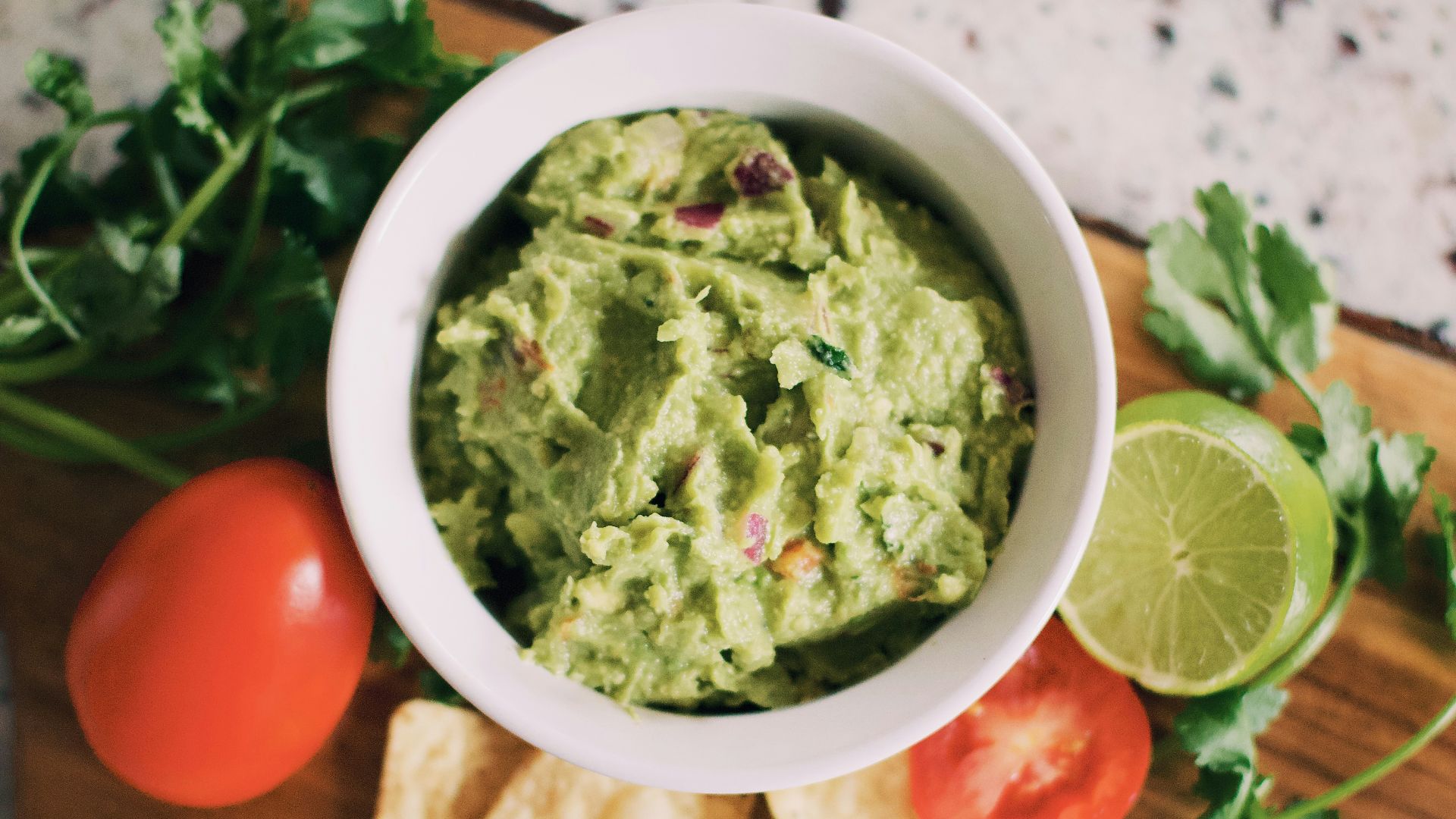 green soup in white ceramic bowl