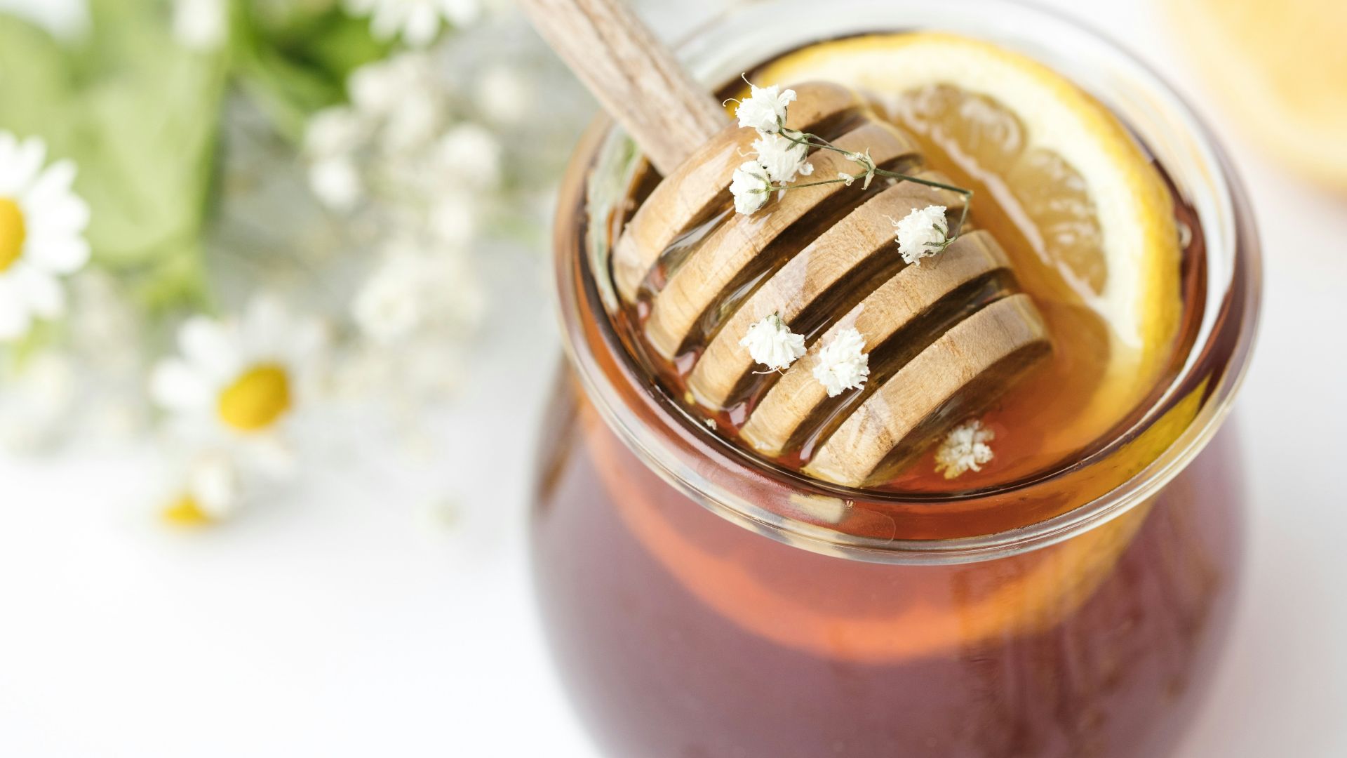 honey in glass on tabel