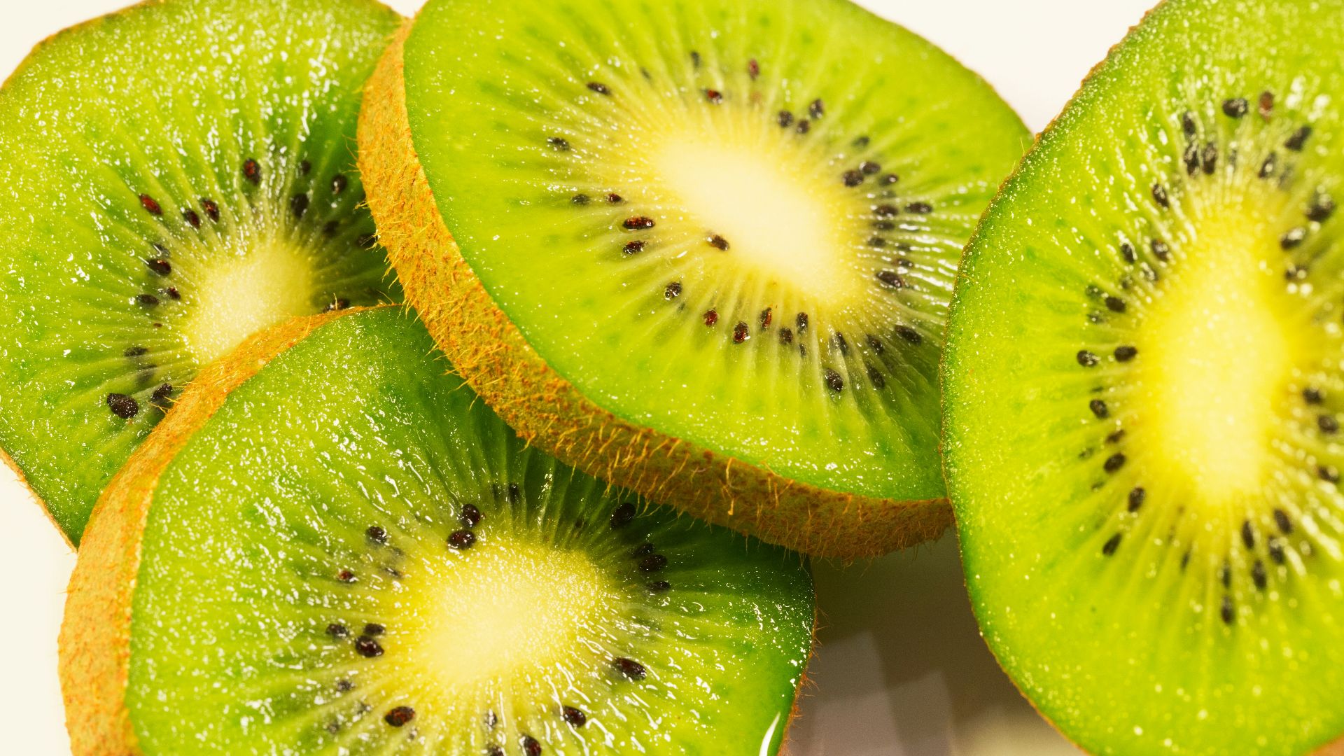 sliced green and red fruit