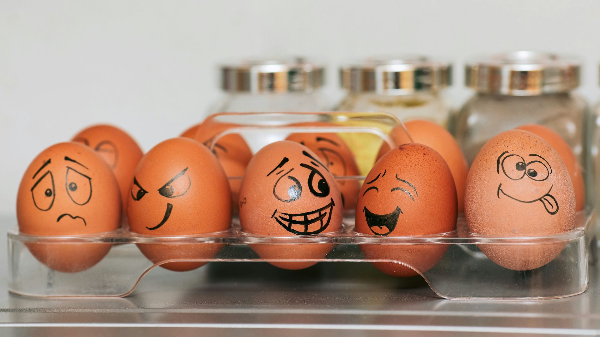orange and white egg on stainless steel rack