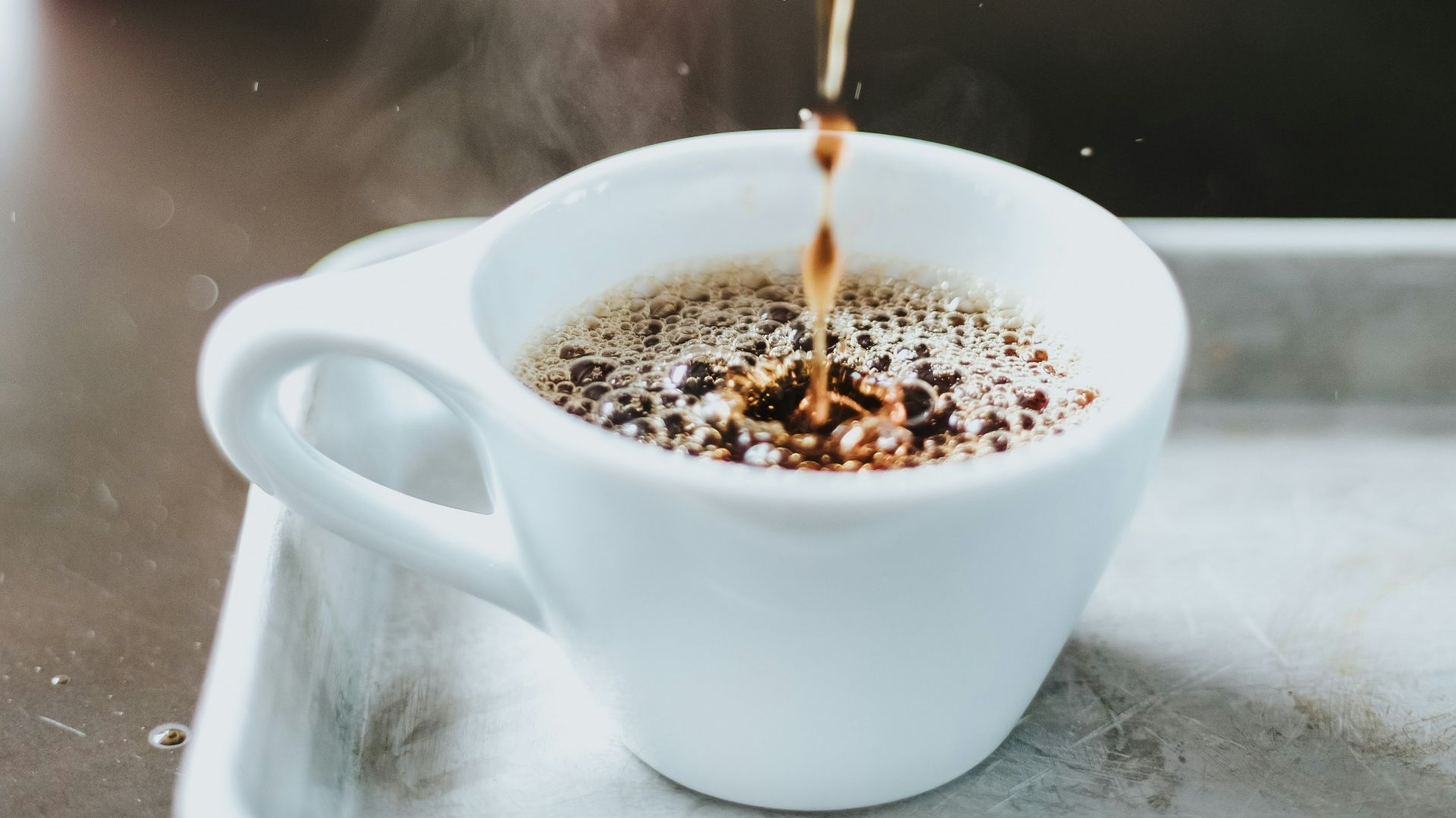 time lapse photography of coffee on cup