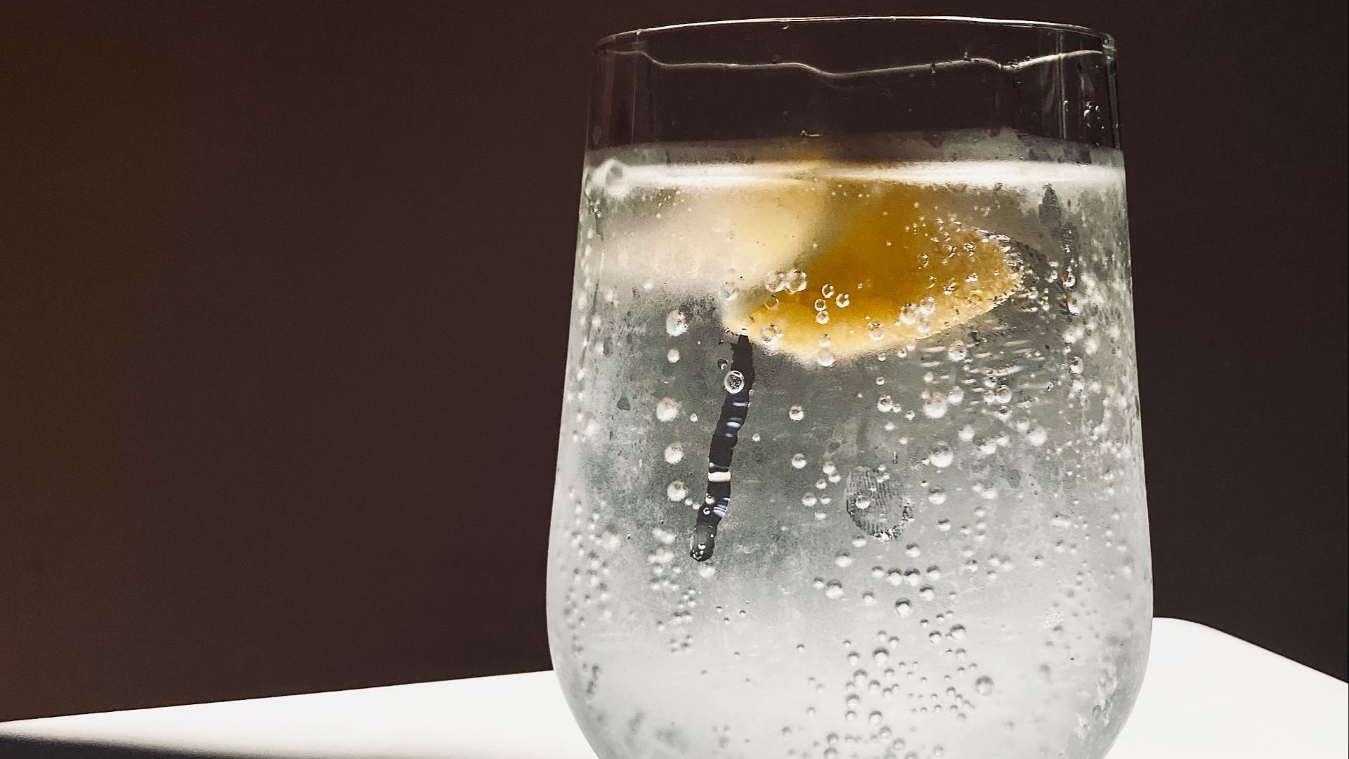 clear glass cup with water