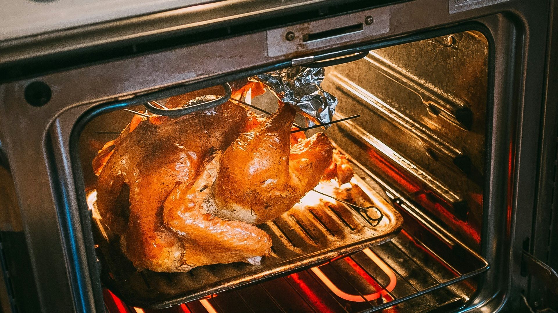 grilled chicken on black and silver grill