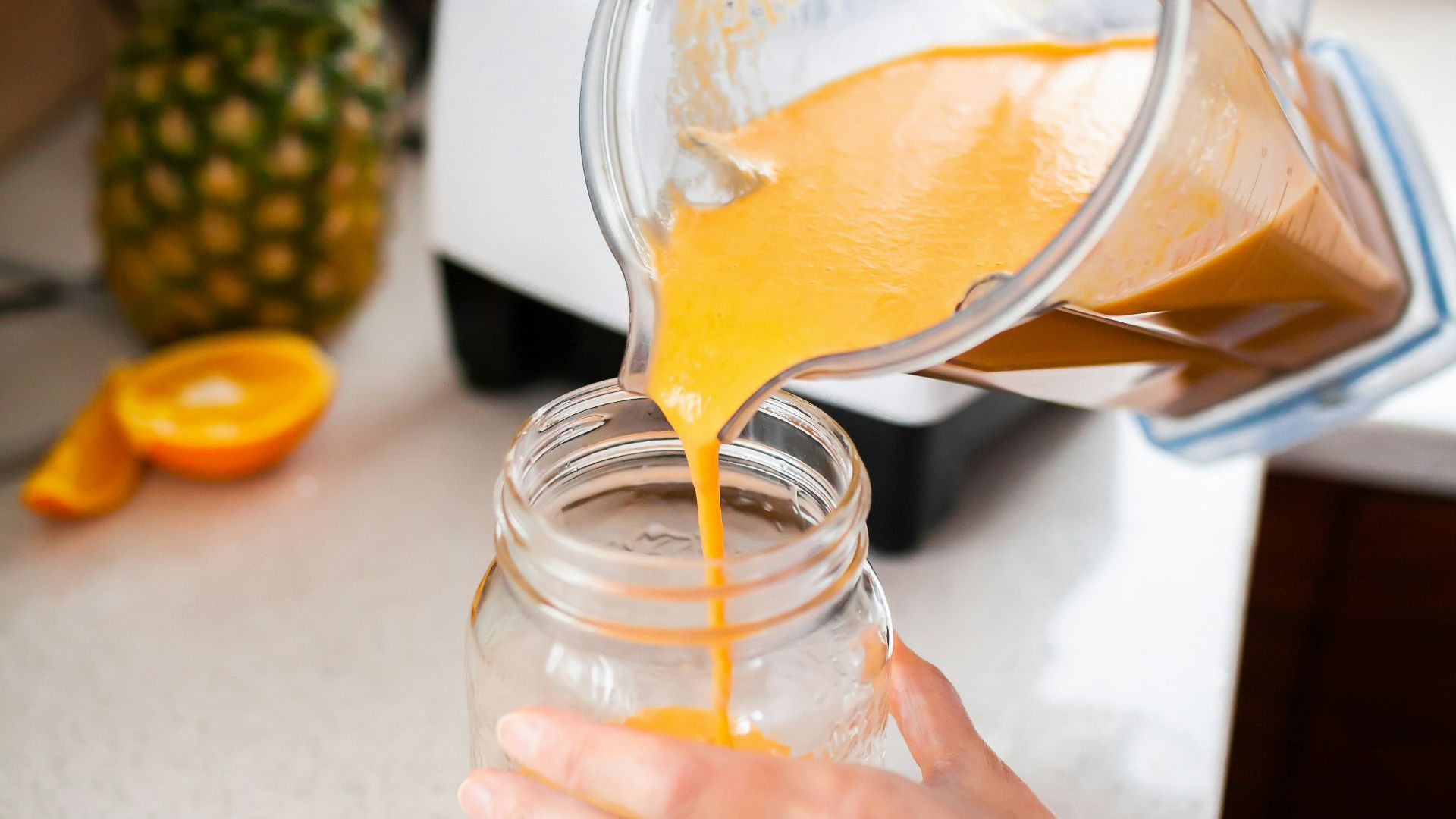 pineapple juice in clear plastic cup